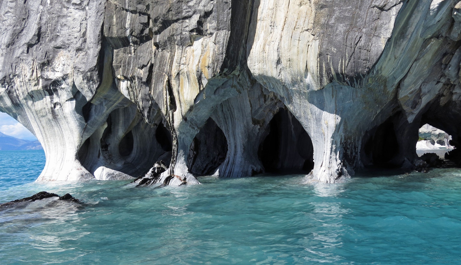 Marble Cave's stunning rock formations and blue water