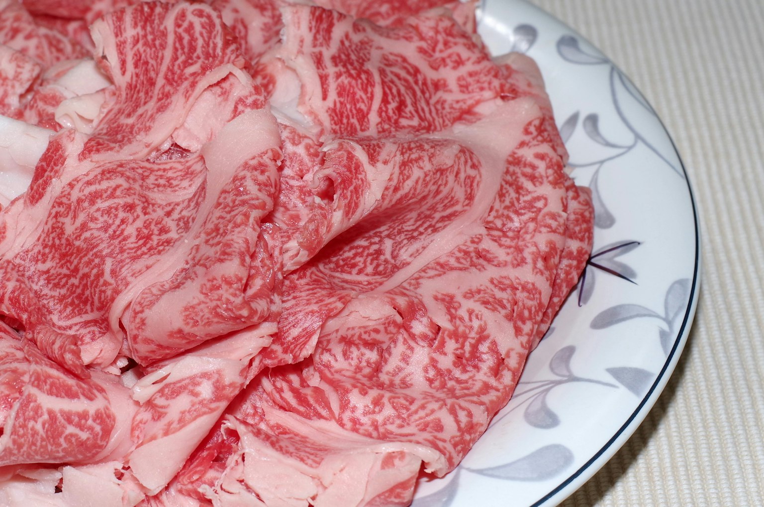 Beautiful marbled wagyu beef arranged on a plate