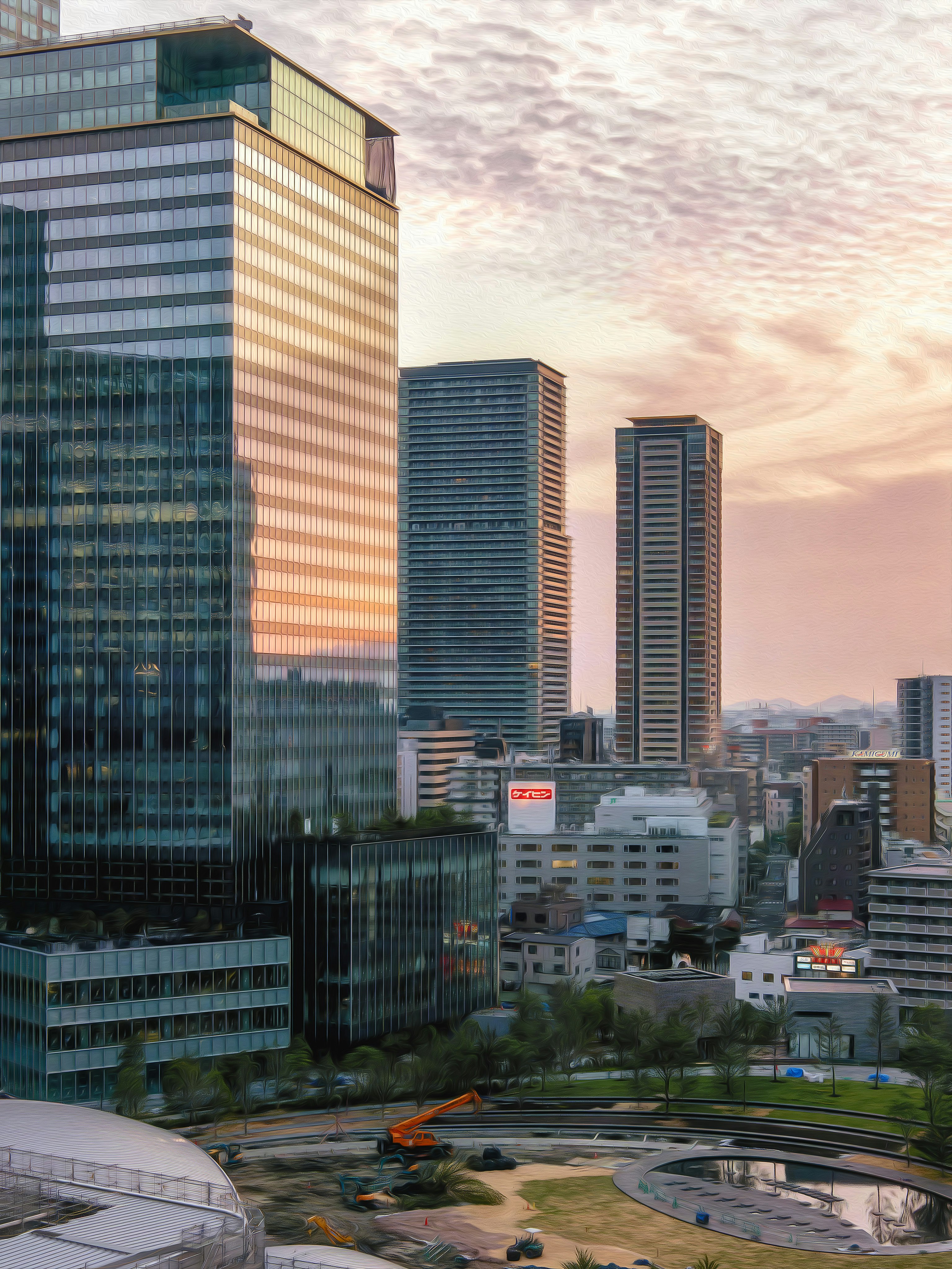 夕暮れの高層ビル群と都市の街並み