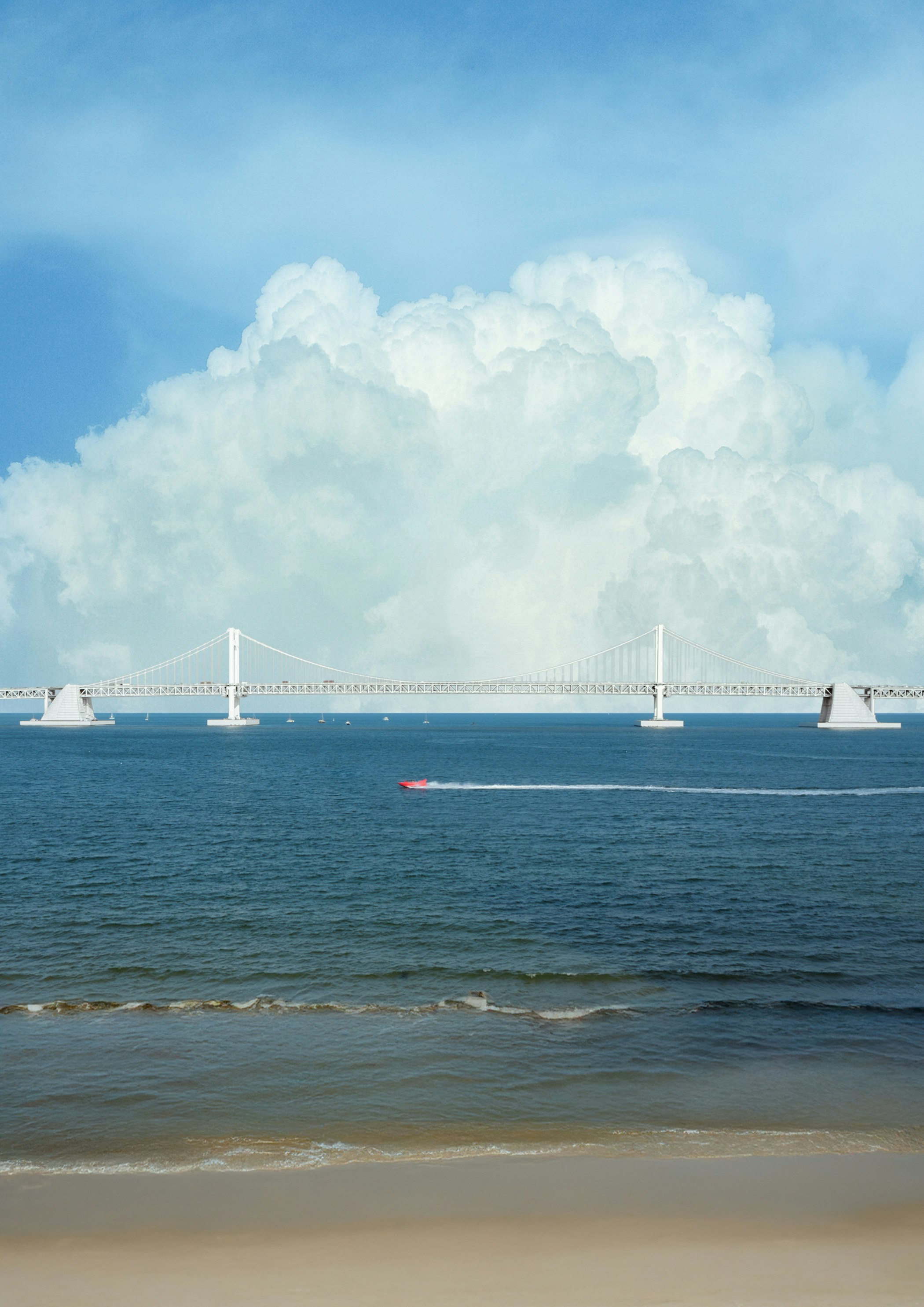 雲の間から見える青い海と大きな橋のある海辺の風景