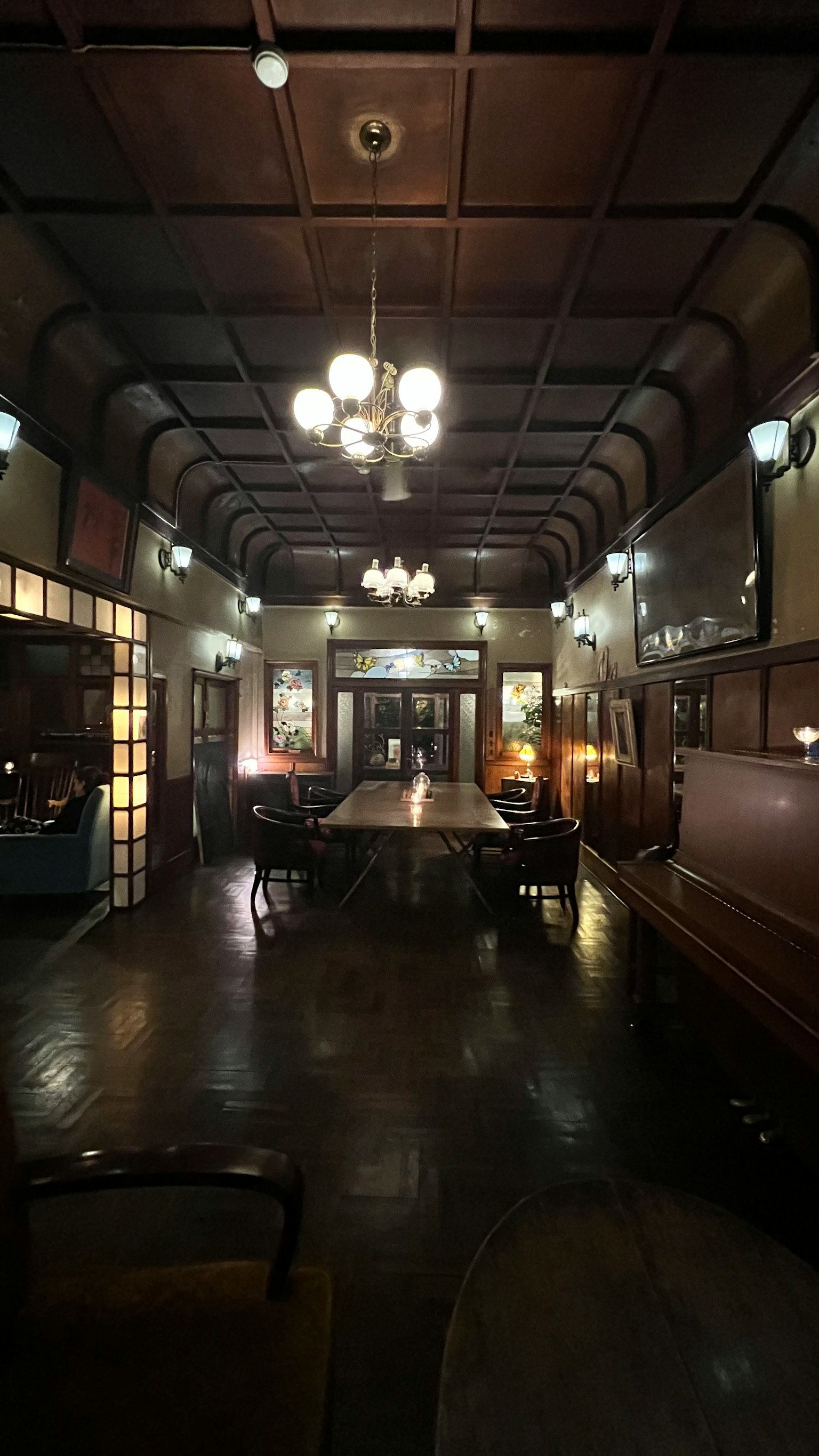 Elegant interior of a restaurant with wooden decor and soft lighting