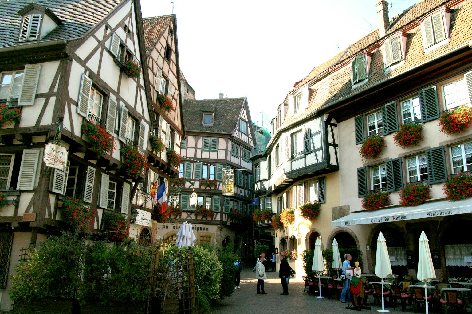 Charming street with traditional half-timbered houses and flower boxes