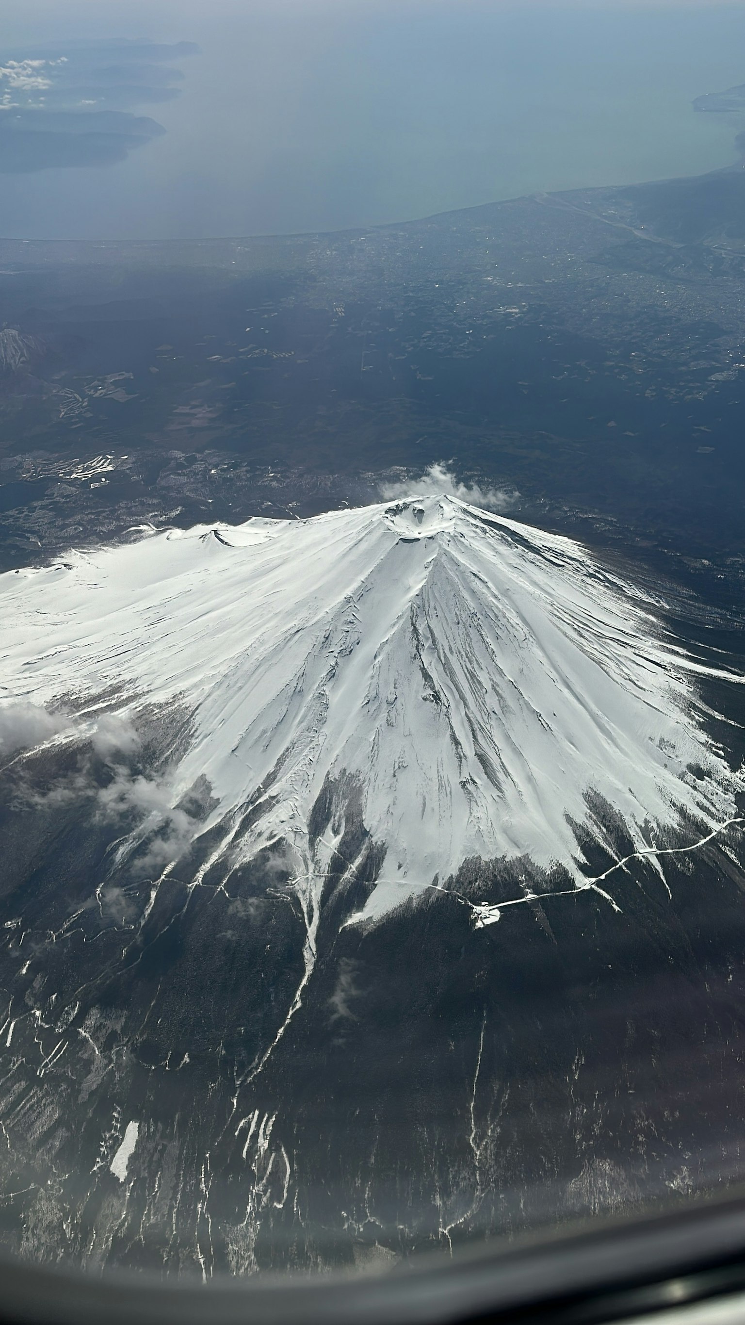 Aerial view of Mount Fuji covered in snow
