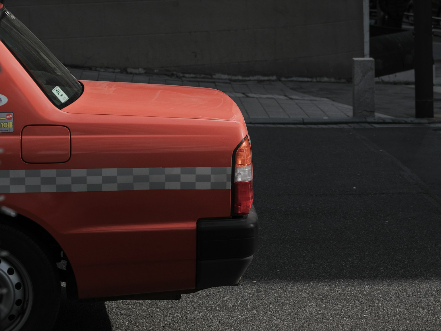 Image showing the side of an orange taxi