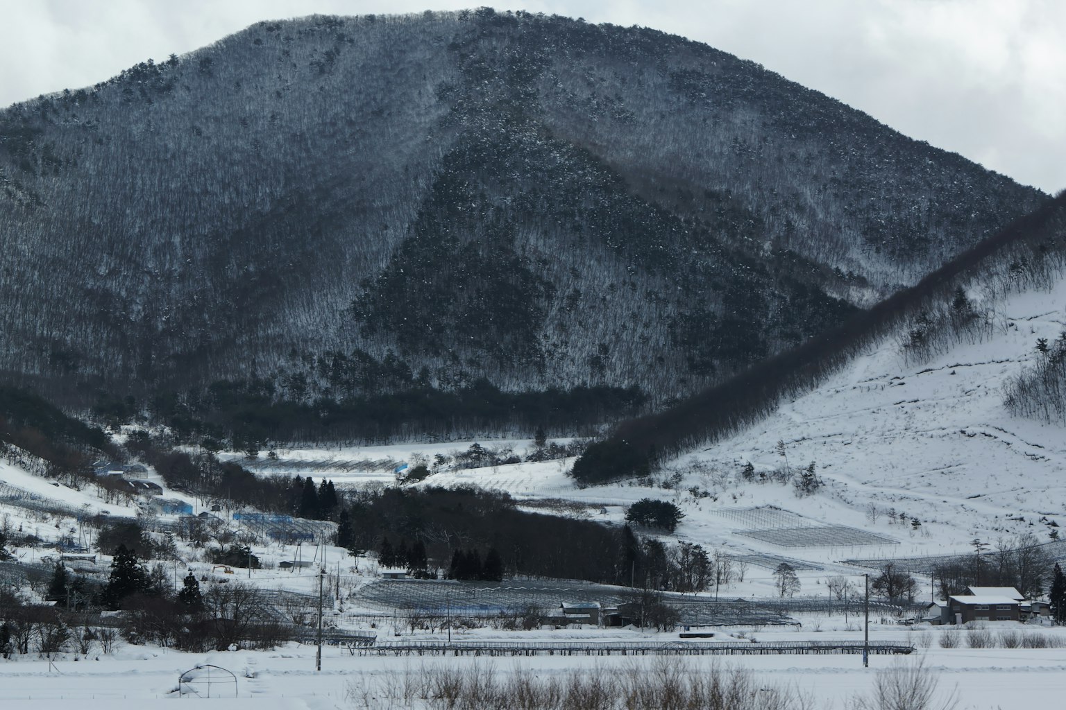 Snow-covered mountains and a serene landscape