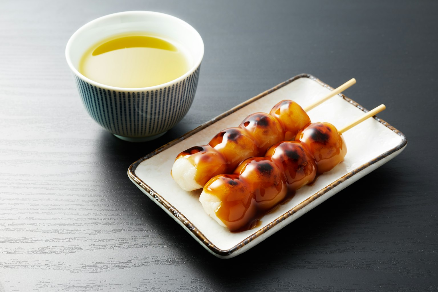 Grilled dango skewers served with green tea