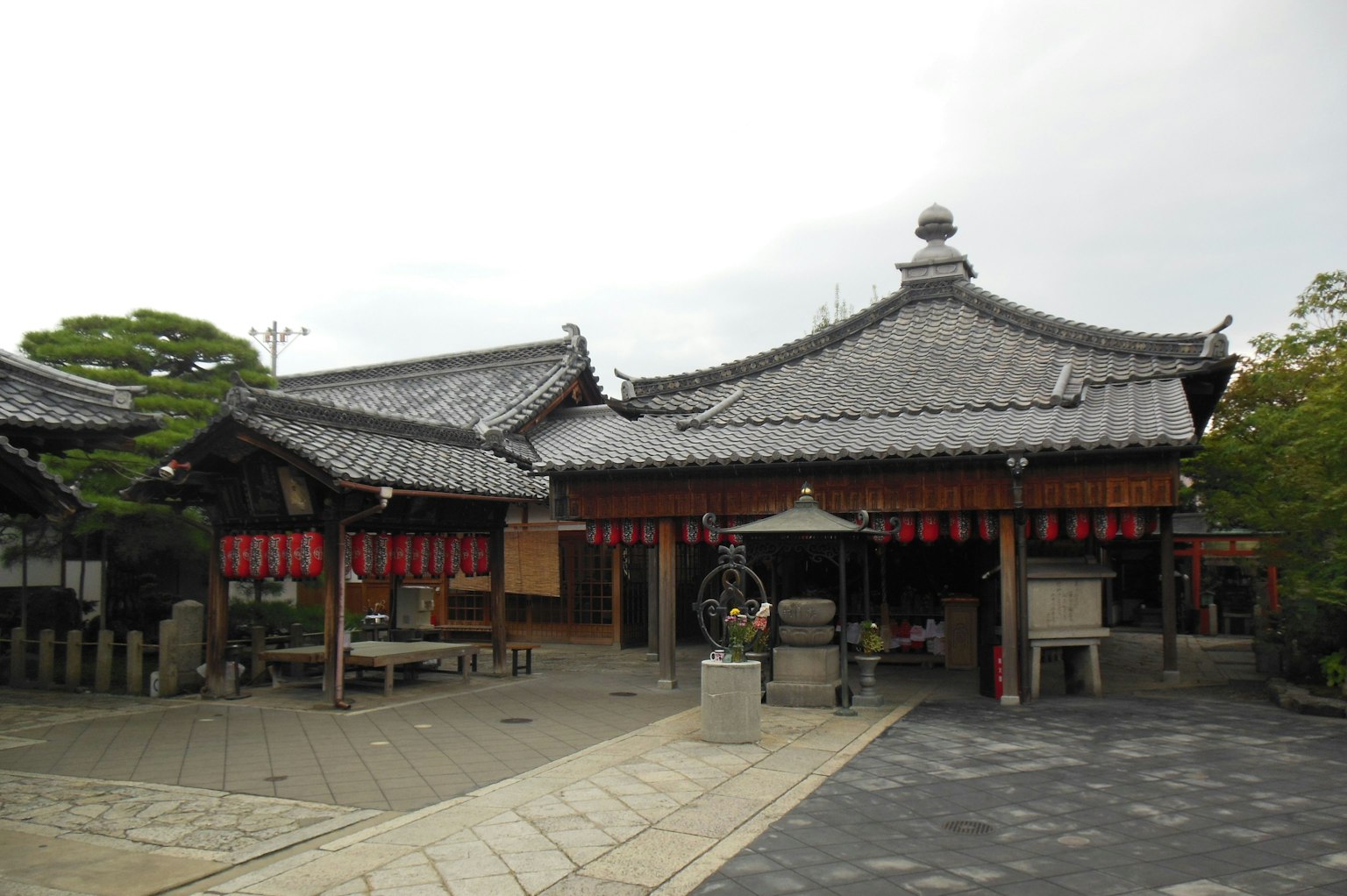 Traditional Japanese temple architecture with distinctive tiled roofs