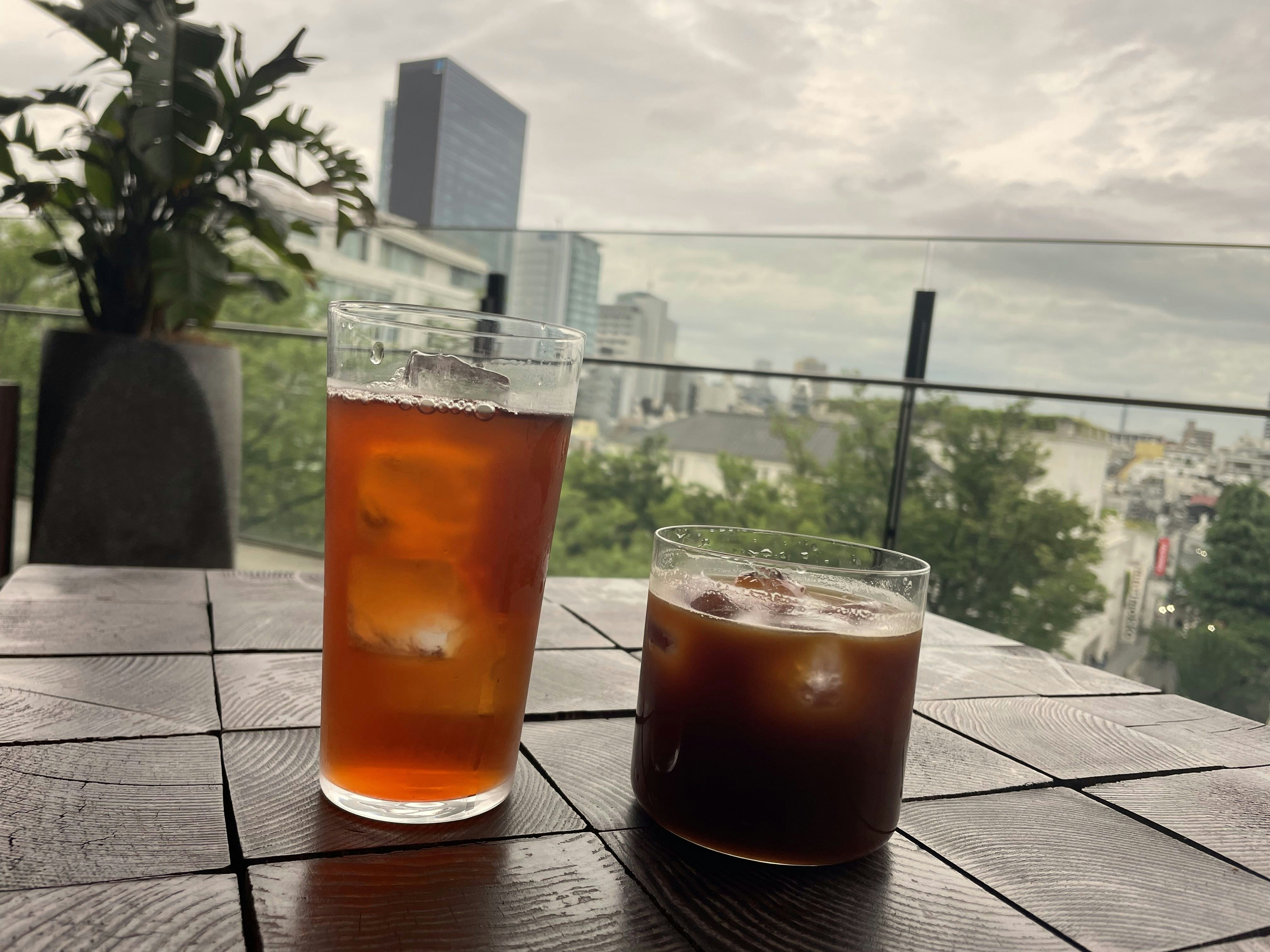 Iced tea and iced coffee glasses on a terrace image