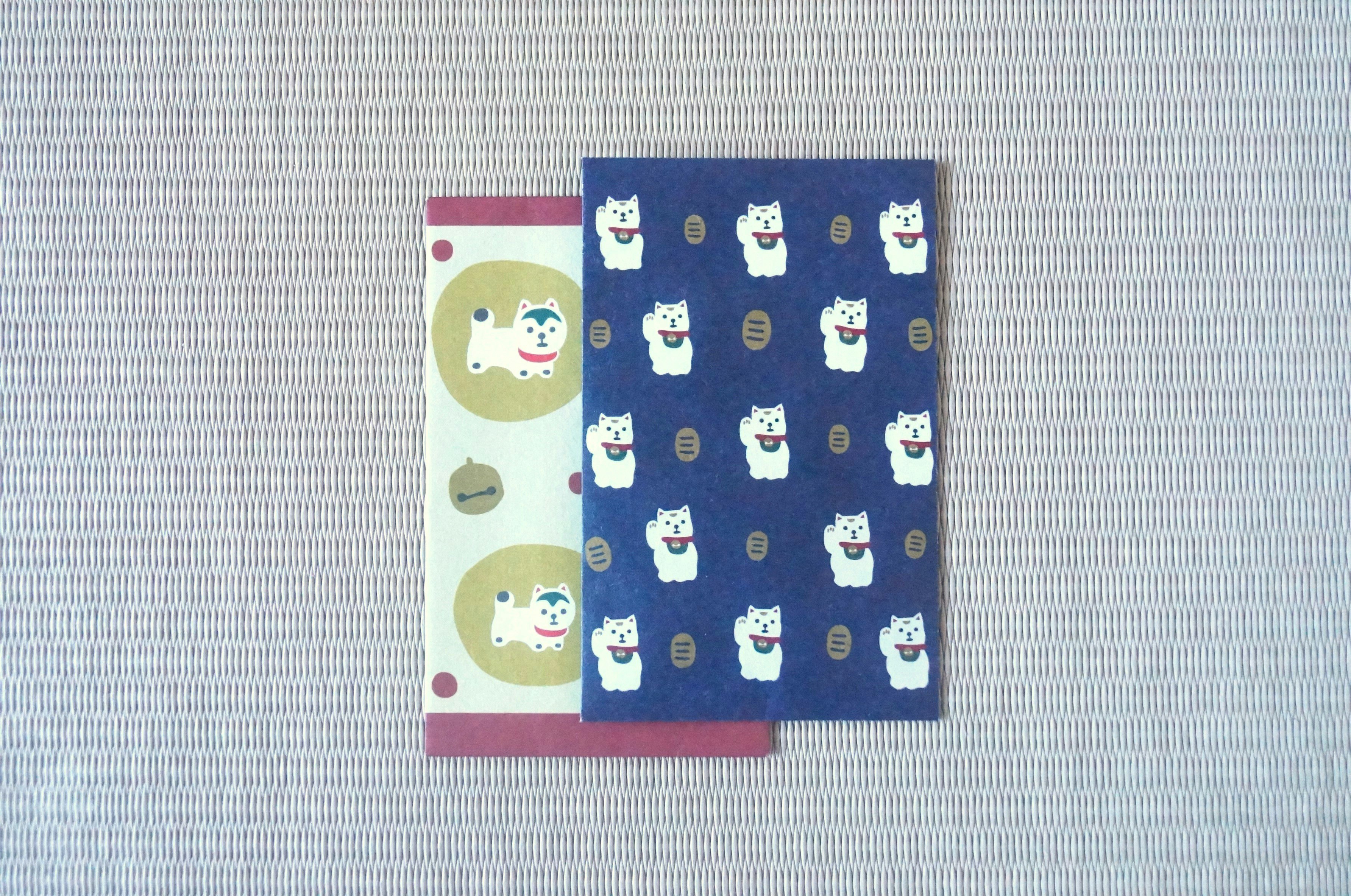 small paper bag and envelope with blue bear pattern
