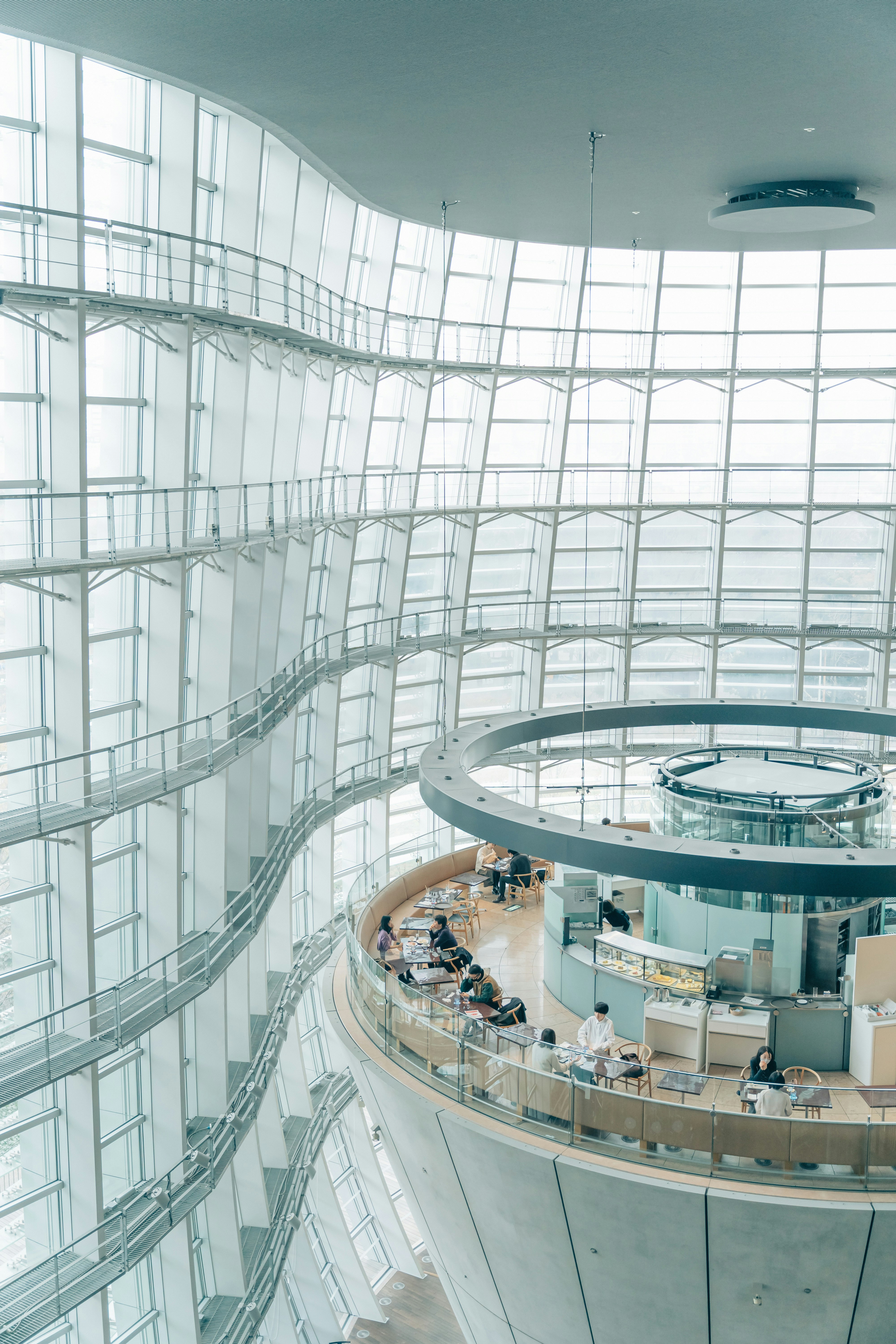 glass atrium interior of the National Art Center, Tokyo