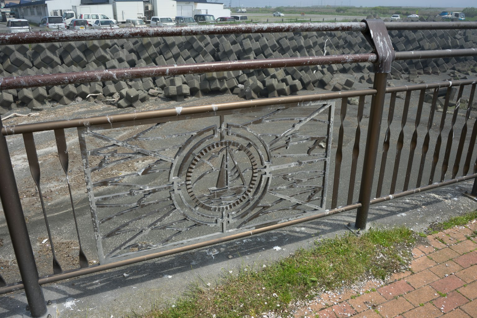 Decorative metal railing featuring a compass design