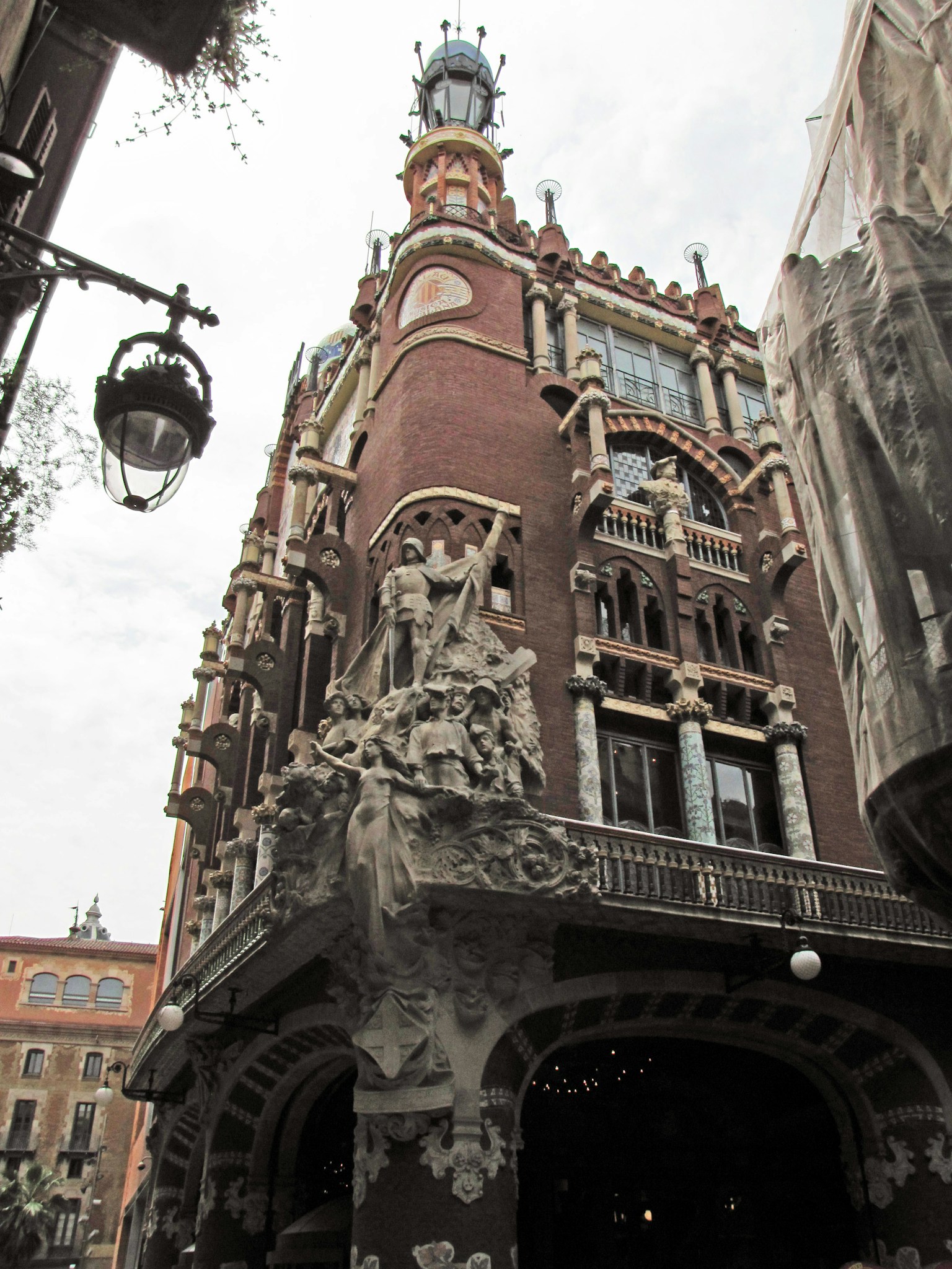 Casa Lleó Morera features unique sculptures and colorful facade