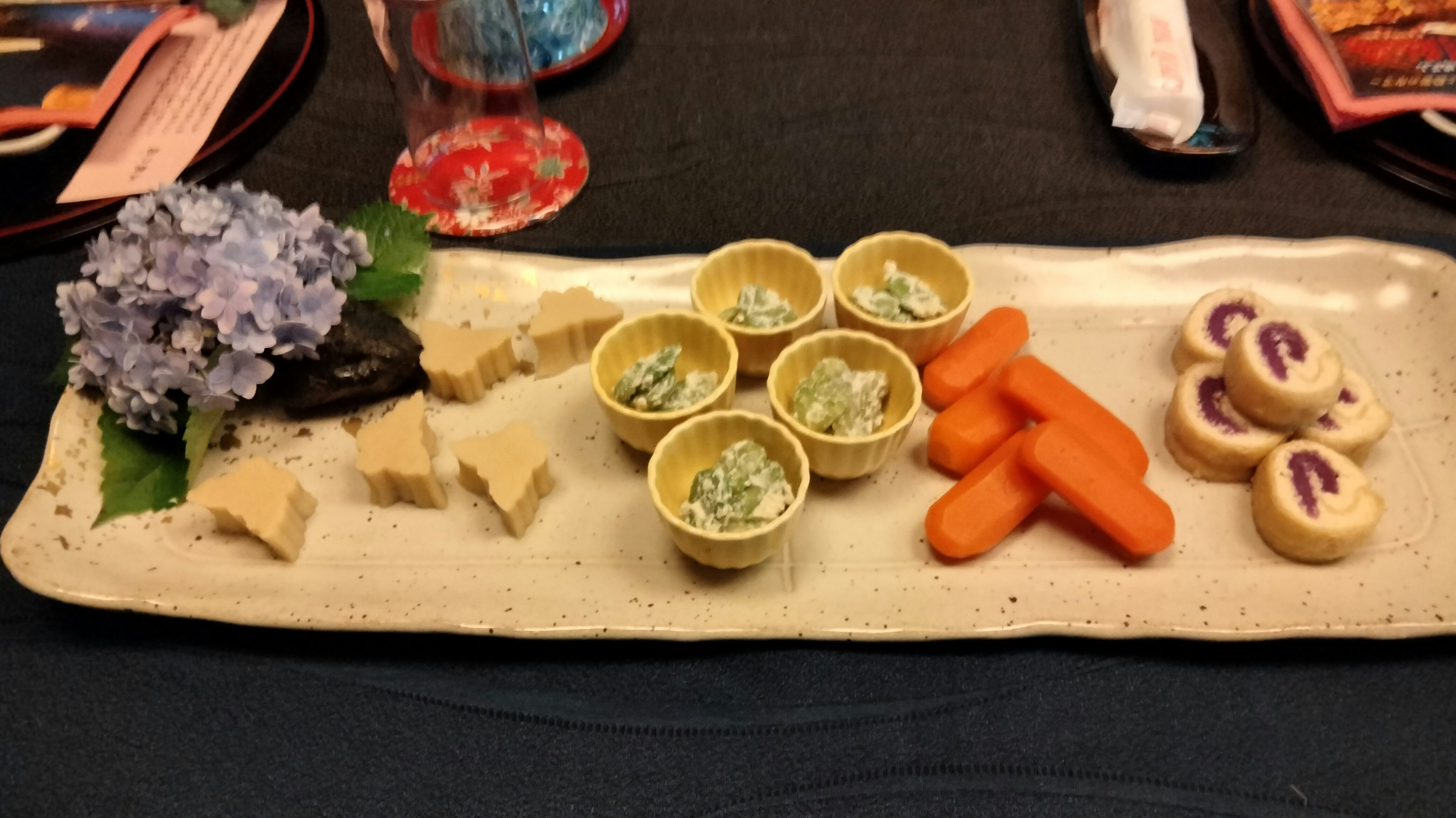 appetizer plate with vegetables and cheese