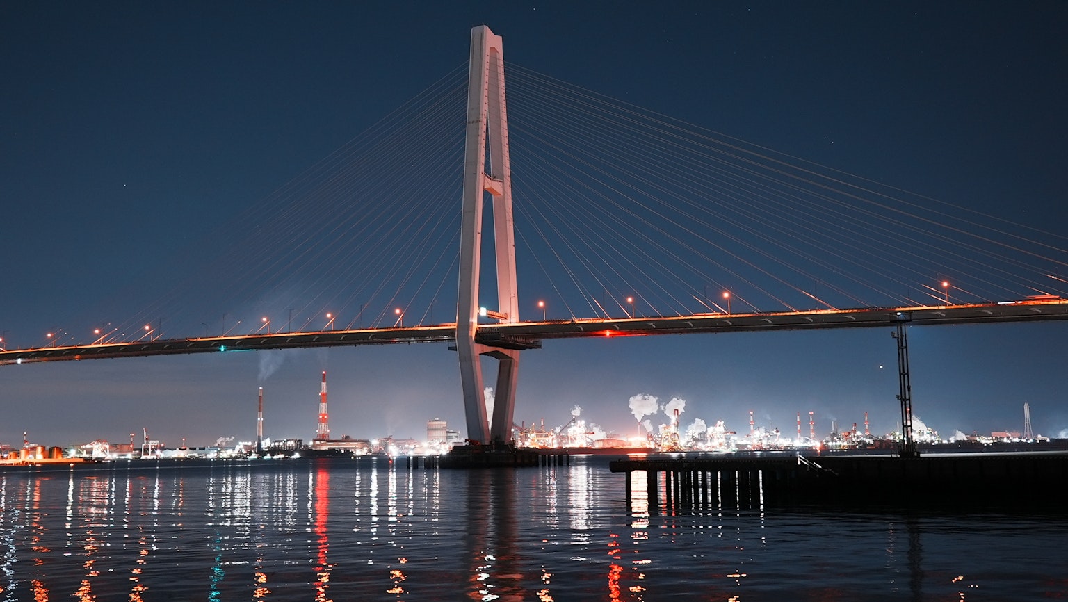 Beautiful bridge in the night with reflections on the water