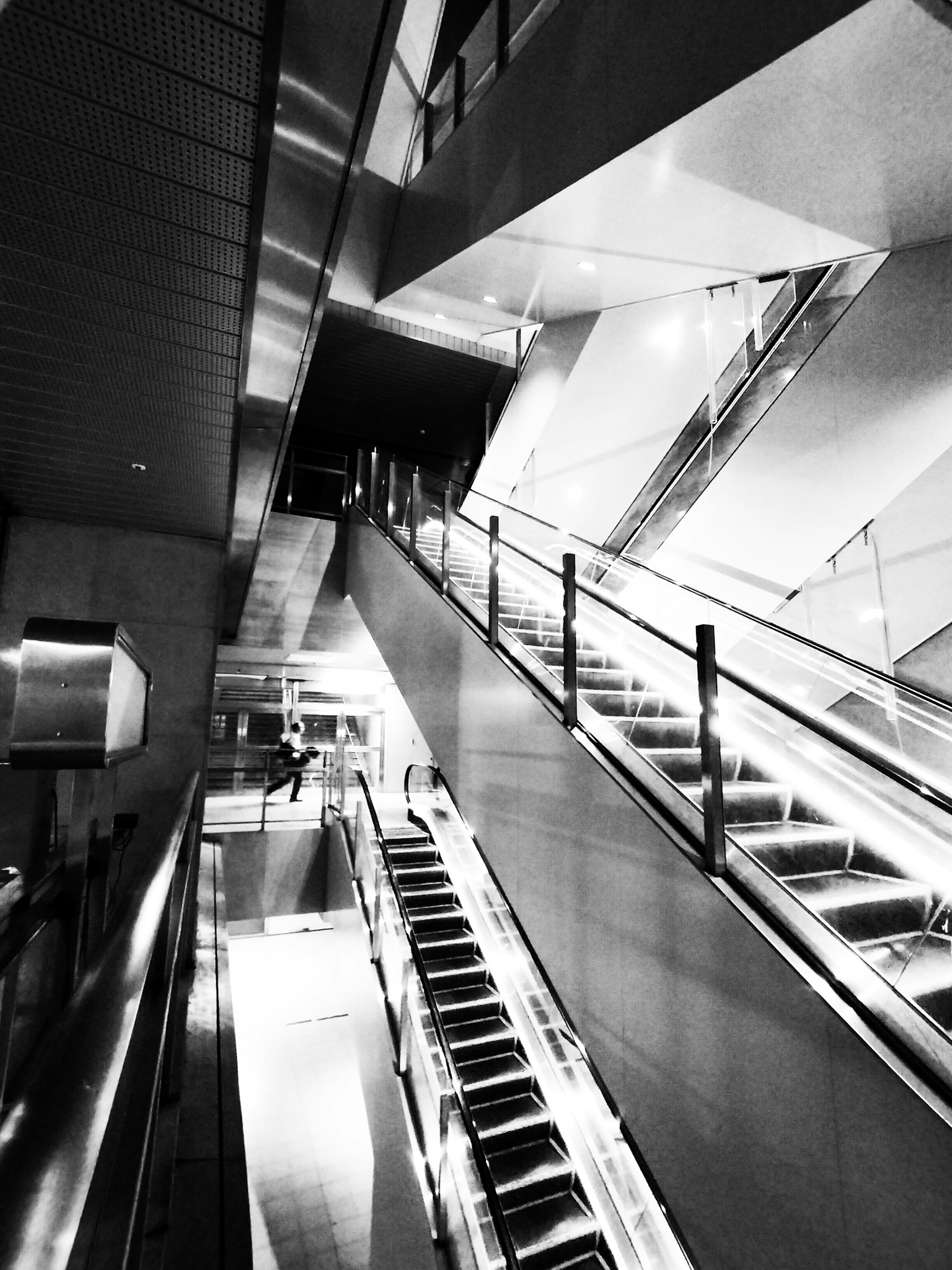 Modern architectural space featuring stairs and railings