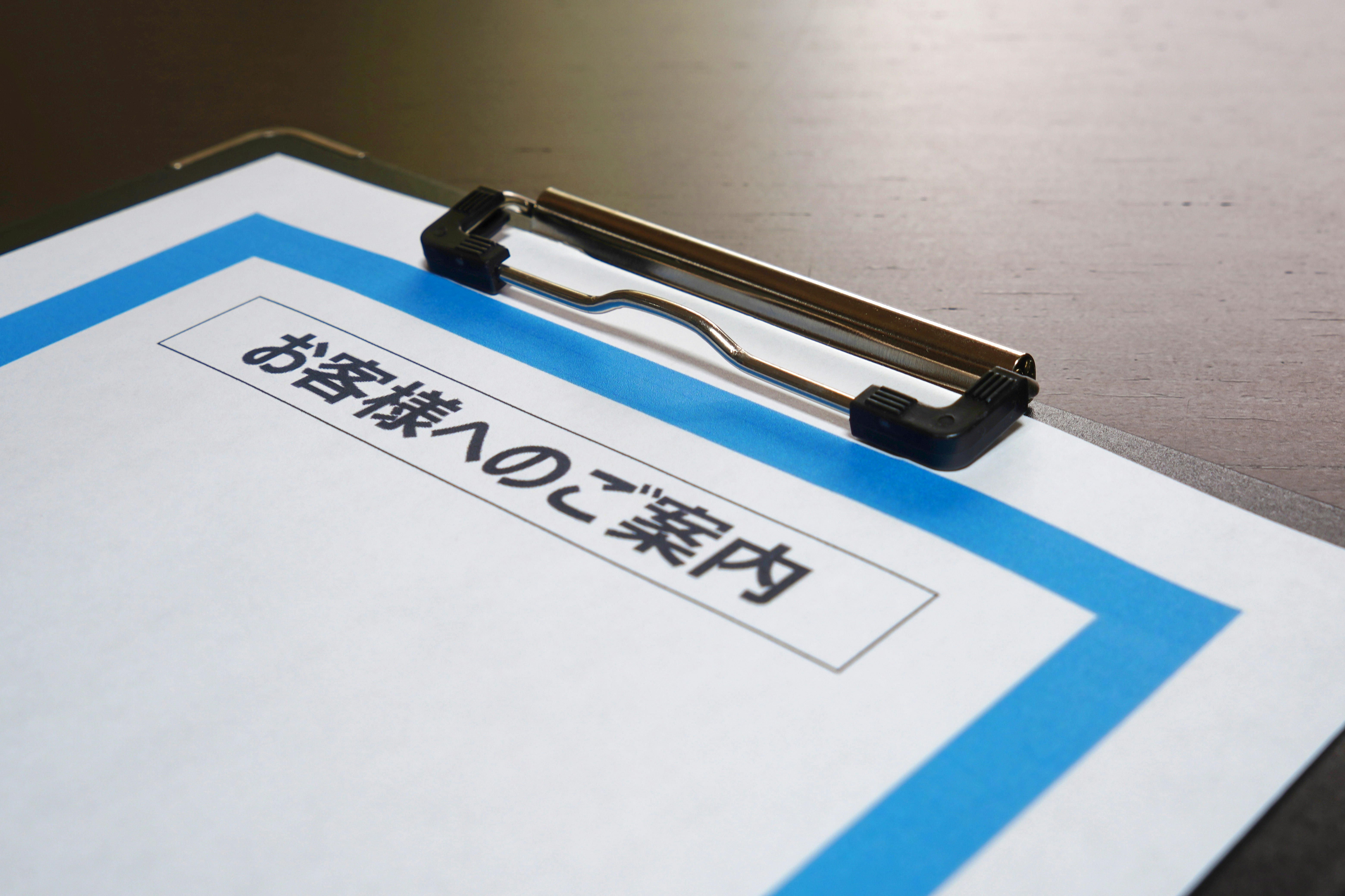 printed document with a blue check mark