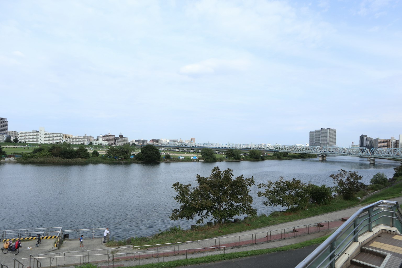 Cityscape featuring a river and a bridge