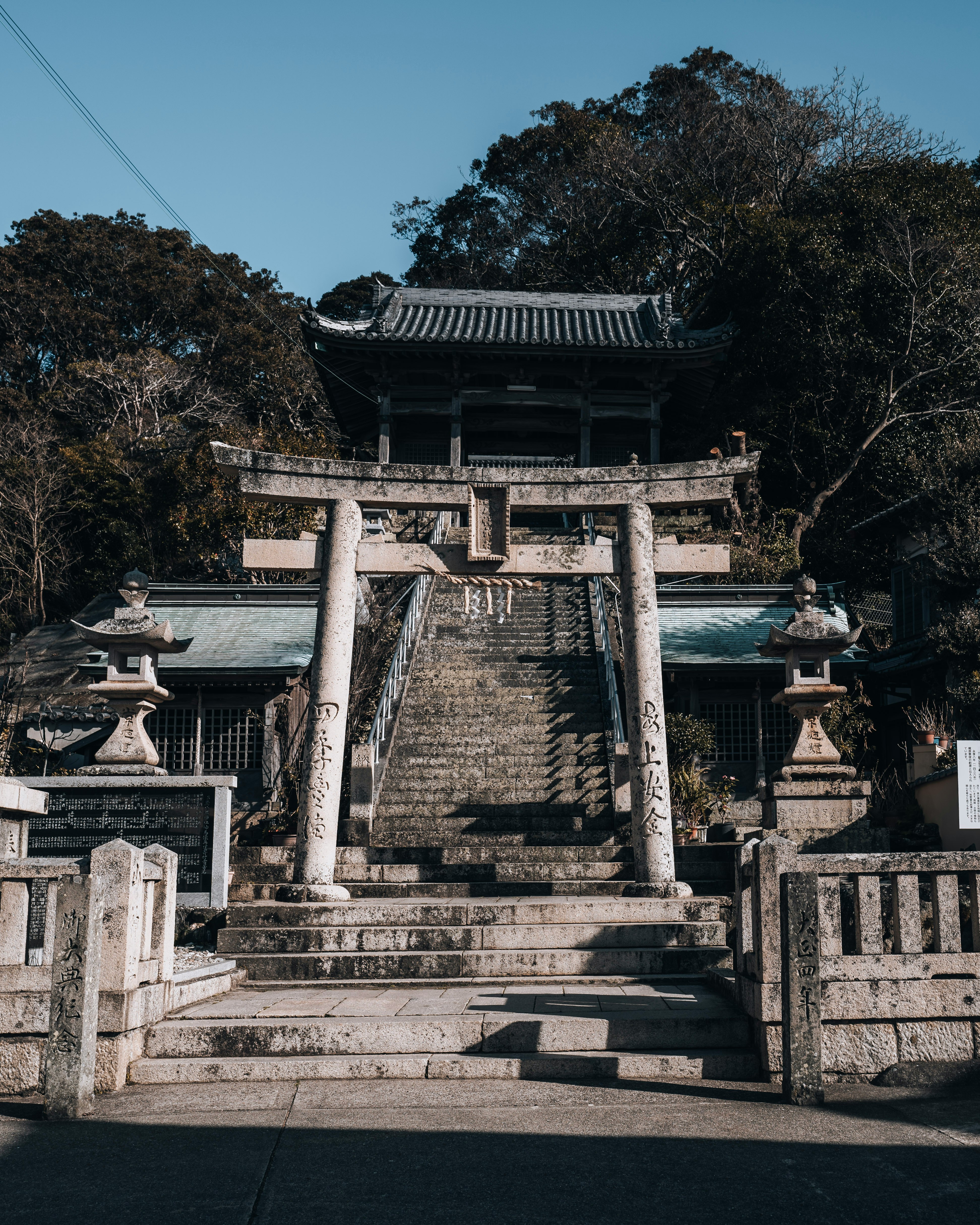Shinto shrine torii gate and stone steps