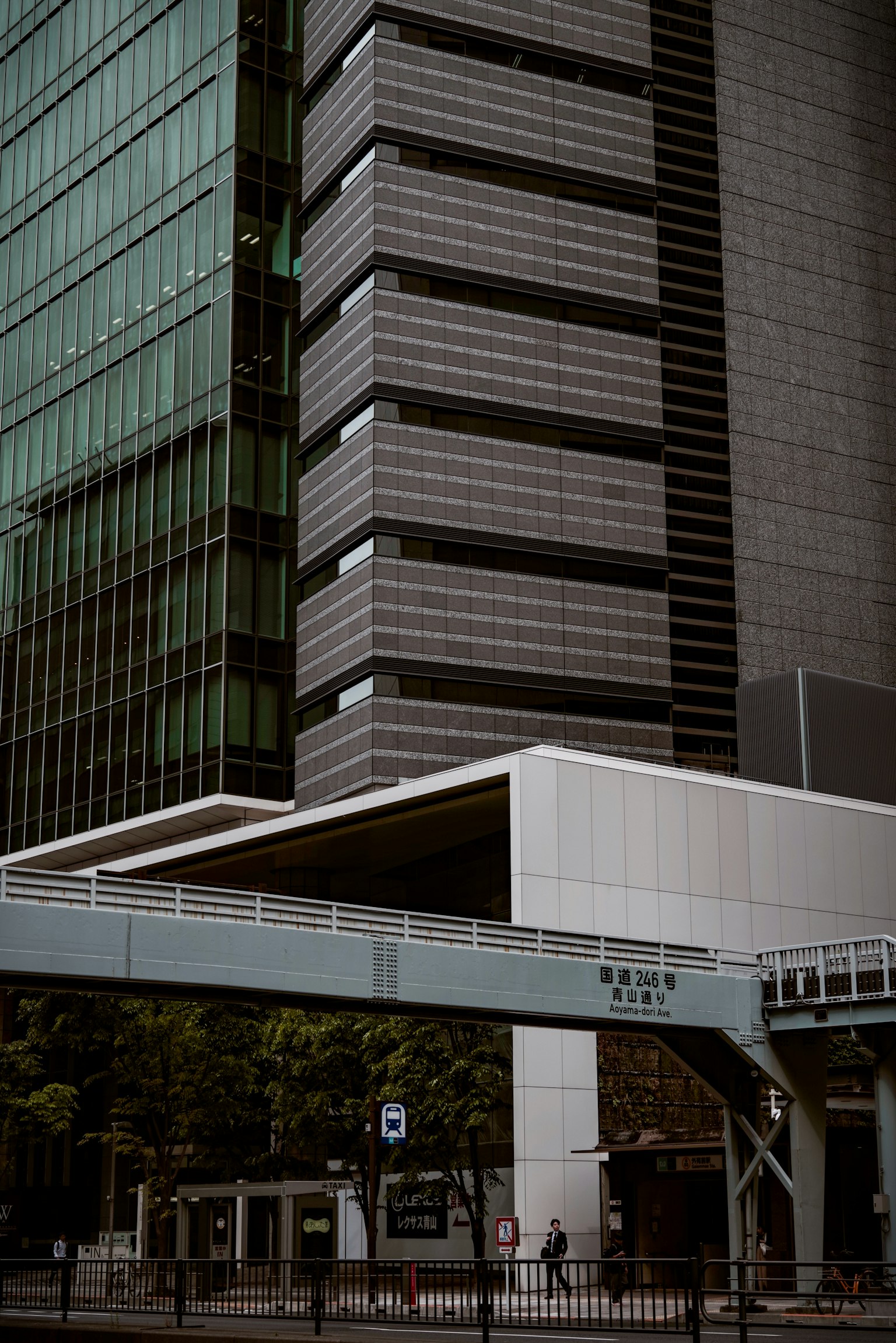 Modern building exterior with glass facade in an urban landscape