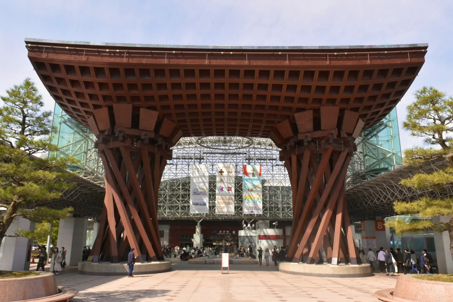 Unique architectural design of the Kanazawa 21st Century Museum with wooden pillars