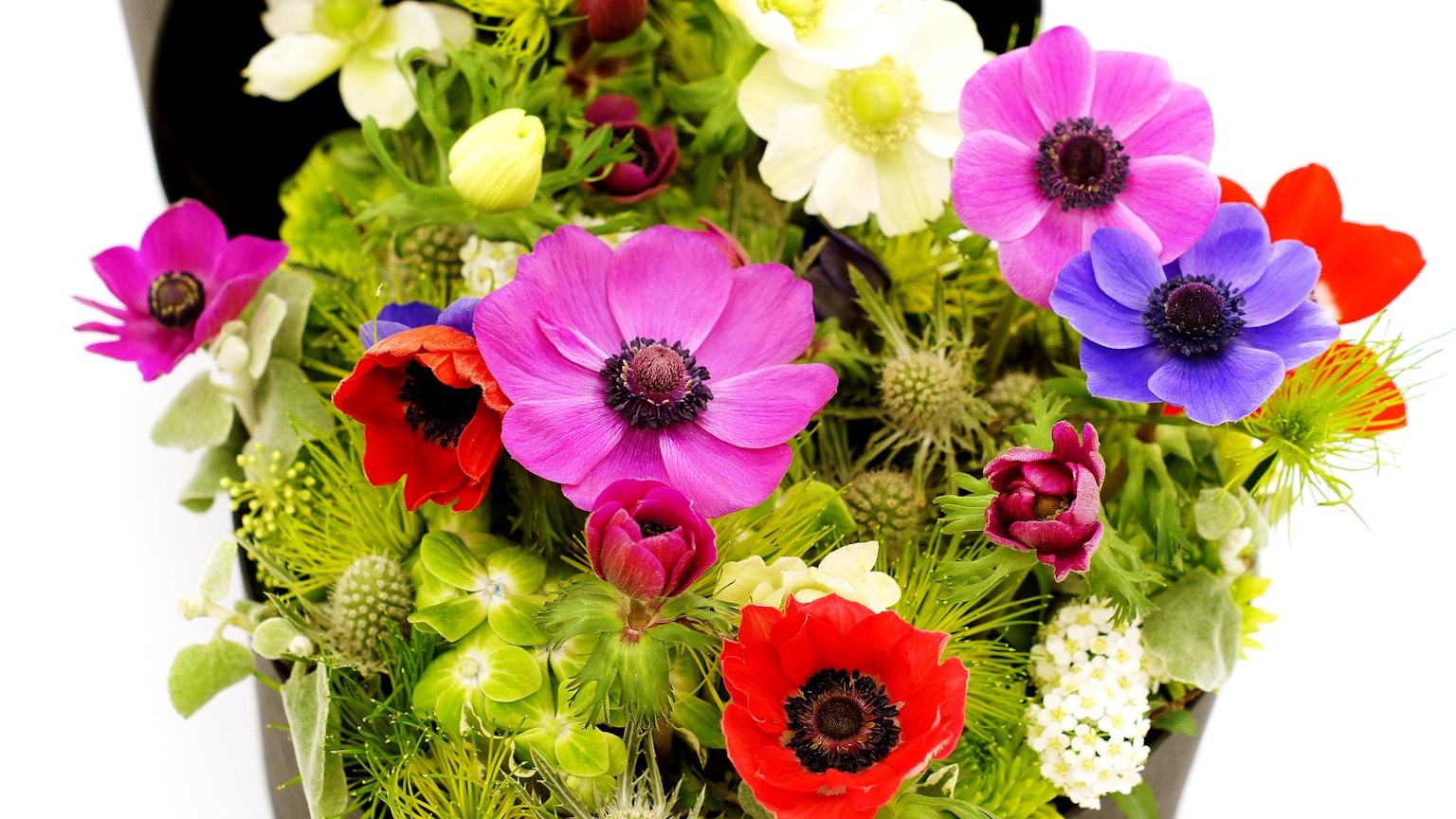 Close-up of a vibrant bouquet featuring colorful flowers