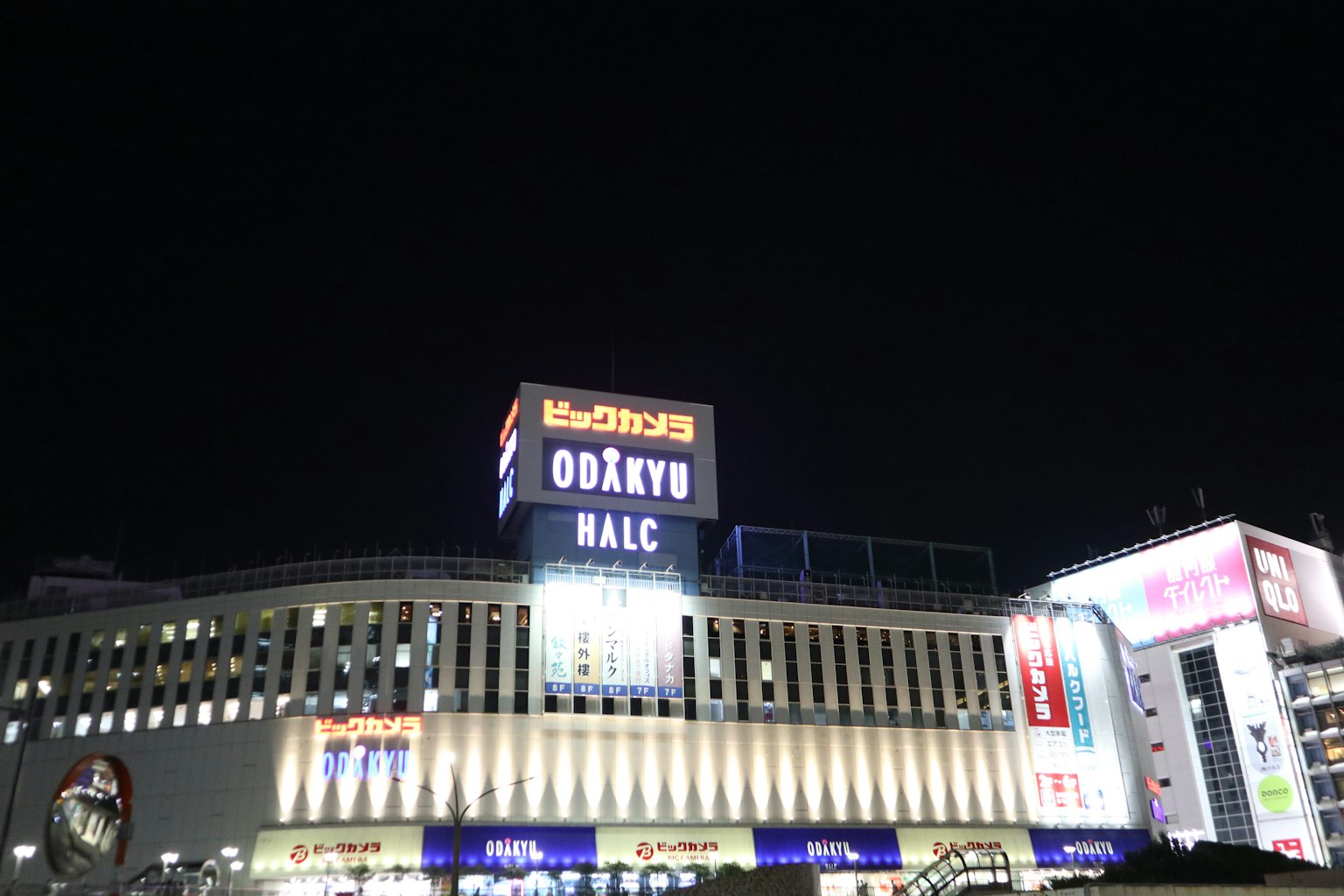Bright signage of Odakyu department store at night