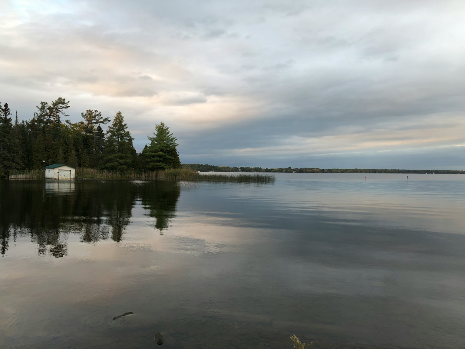 Calm lake view with serene sky
