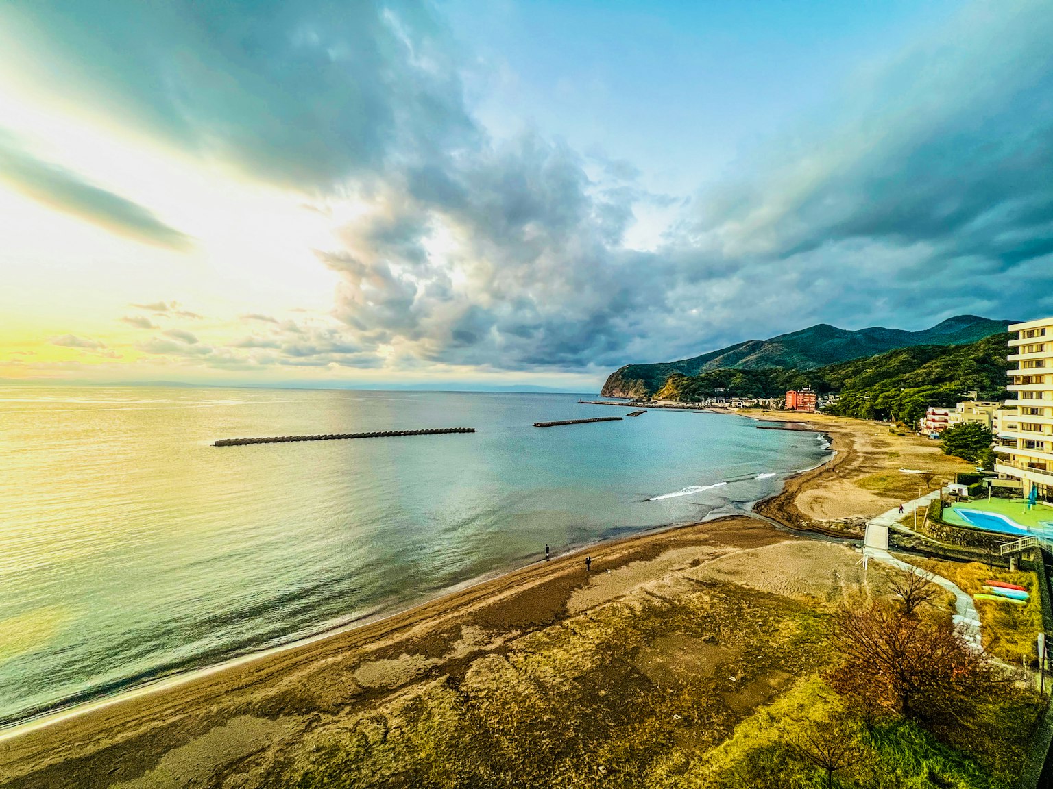 Scenic coastline with gentle waves and a serene sky