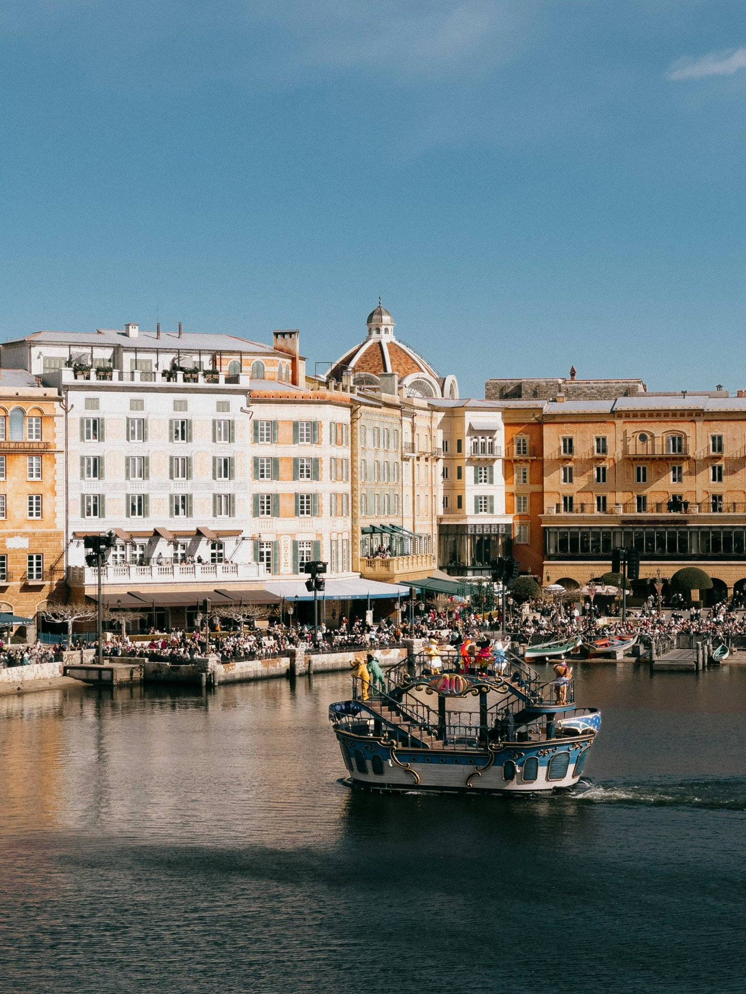 Scenic view of a docked boat and surrounding buildings by the waterfront