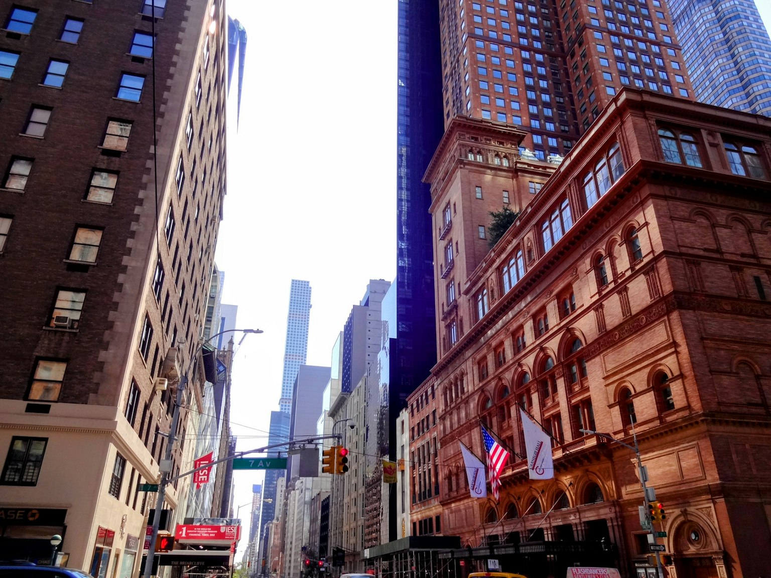 View of New York street with historic buildings and skyscrapers