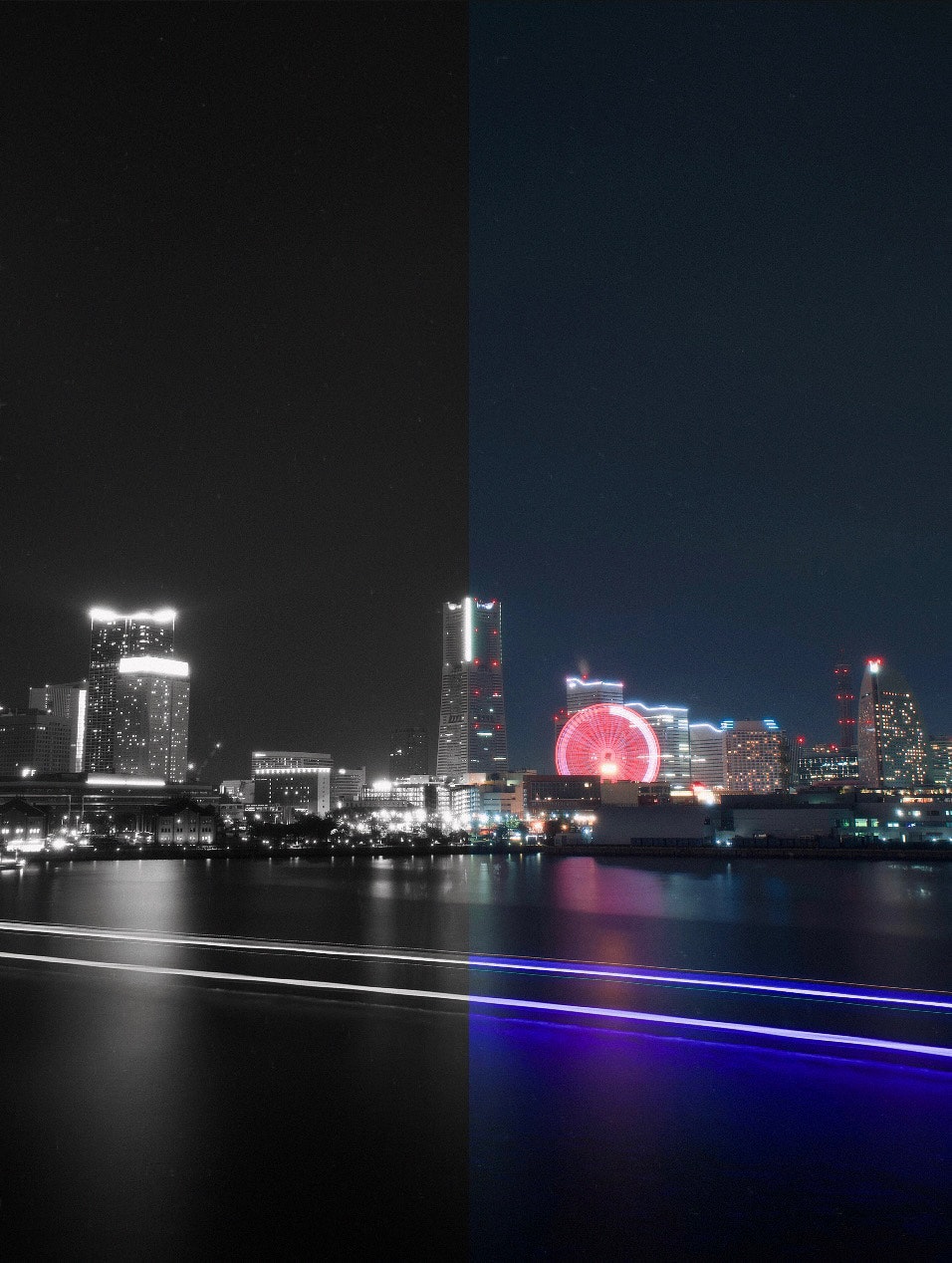 Paesaggio urbano notturno con metà nell'oscurità e metà illuminata da edifici e riflessi di luce