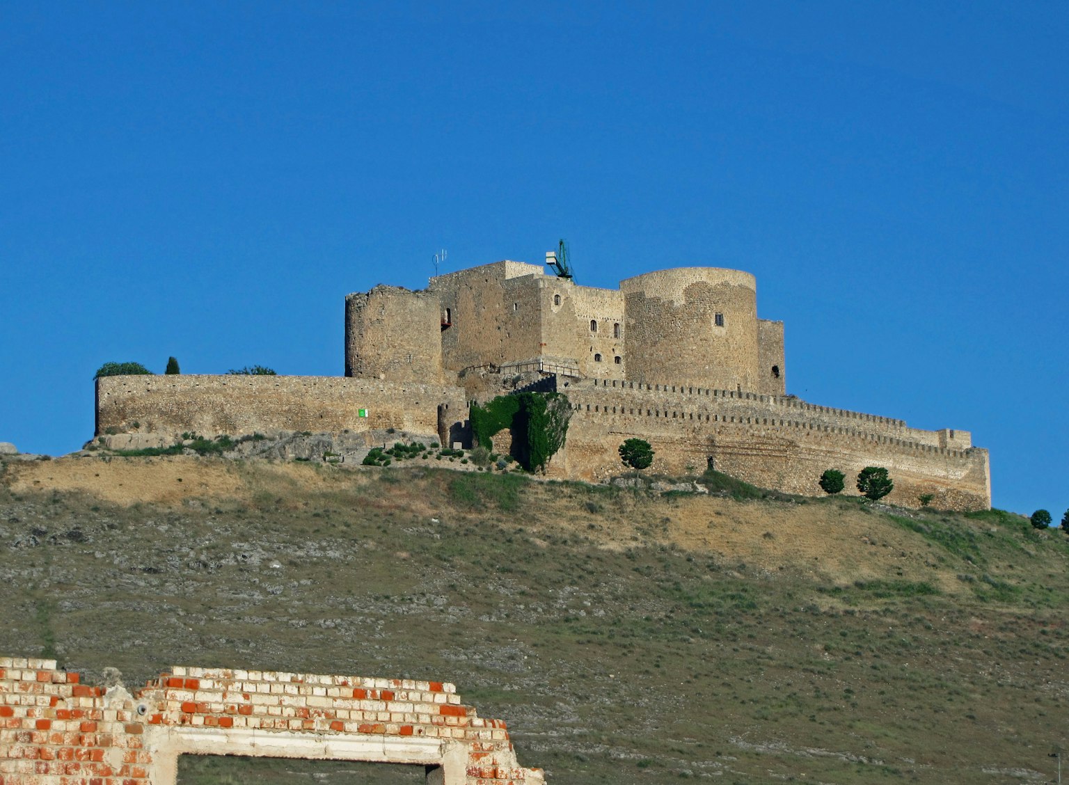 Ancient fortress standing tall under a clear blue sky