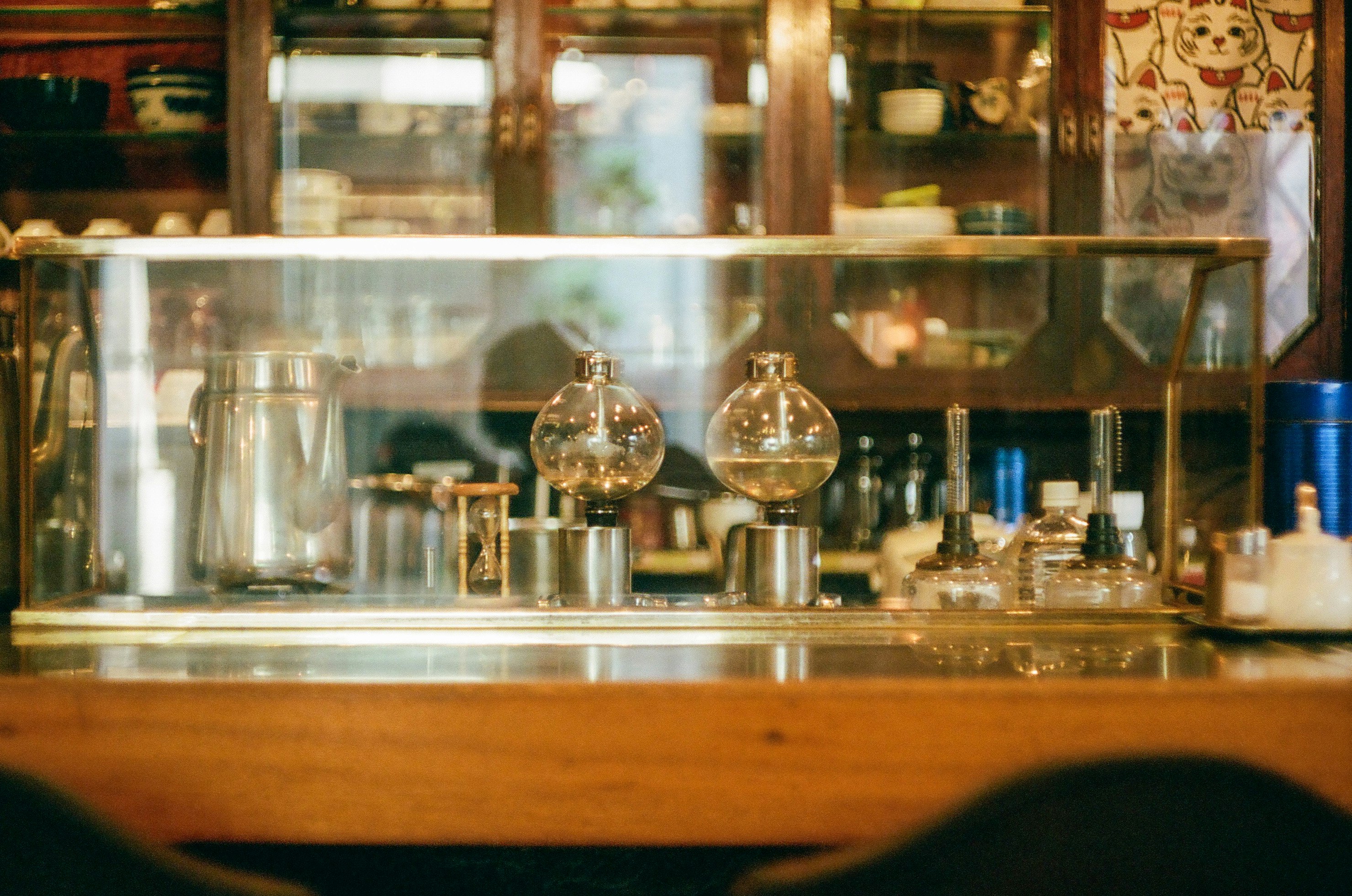 interior counter with glass jars and small bottles