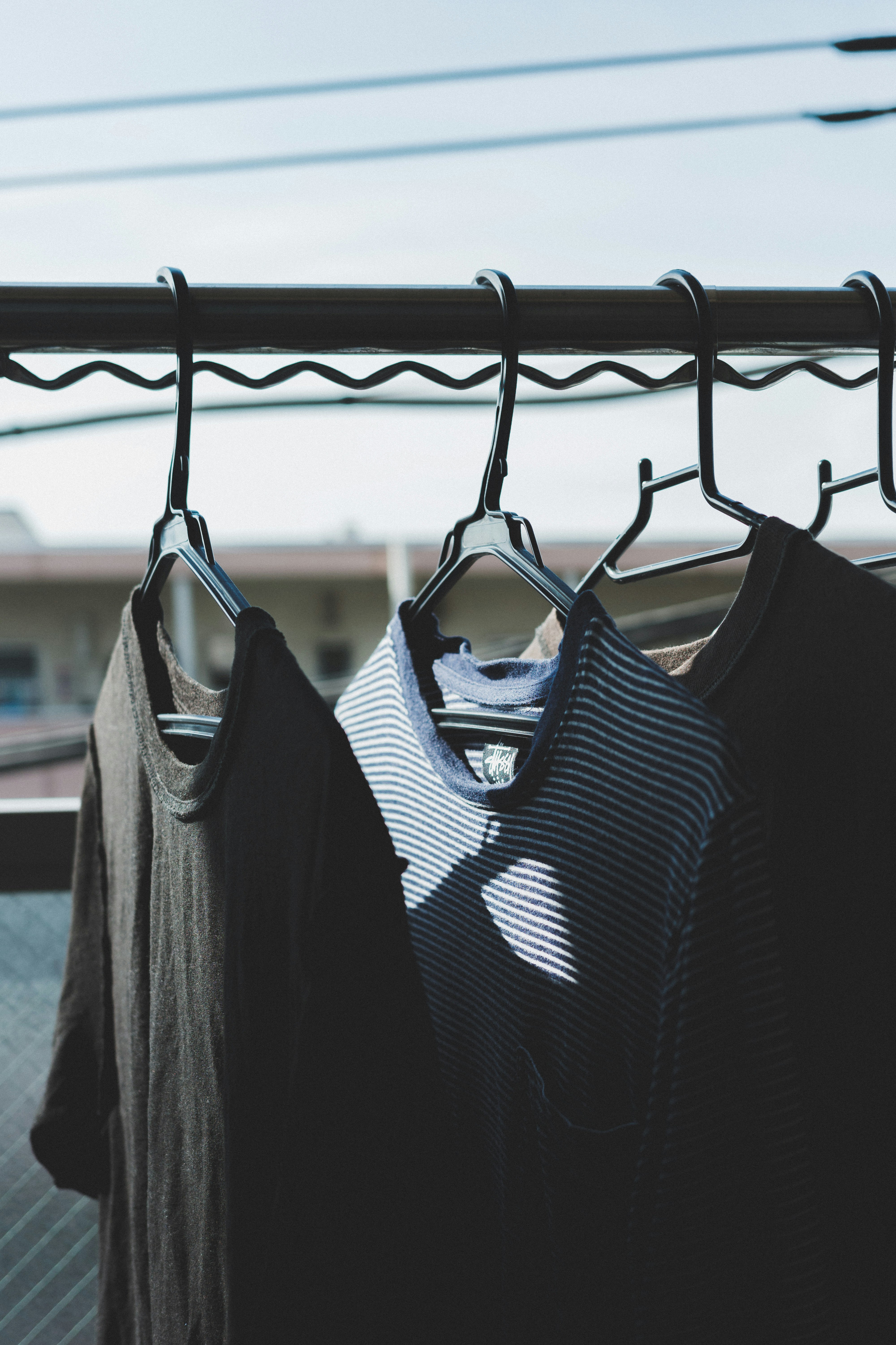 Close-up of laundry hanging on a clothesline rack
