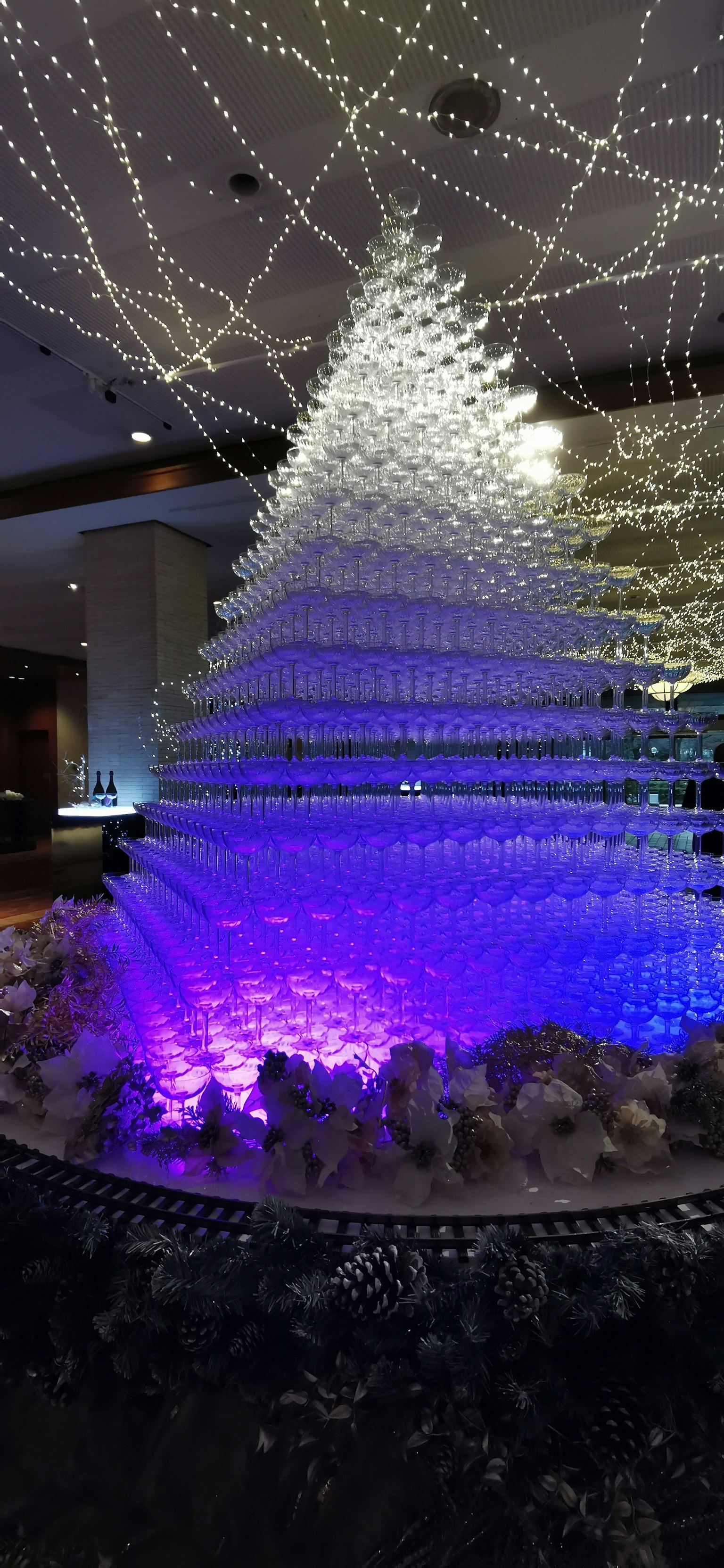 A stunning installation of a Christmas tree decorated with beautiful lights