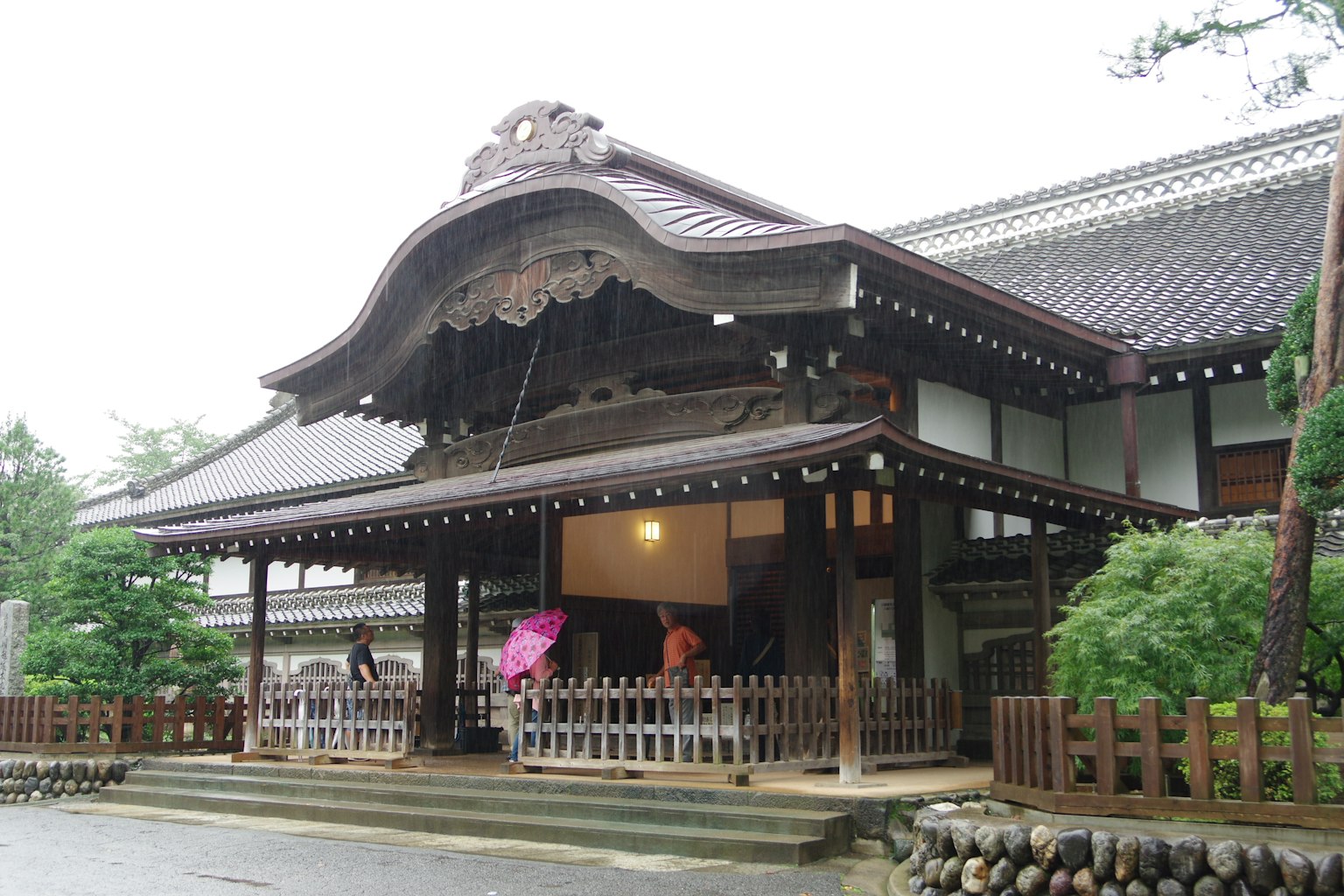 Traditional Japanese building with ornate roof and wooden structure
