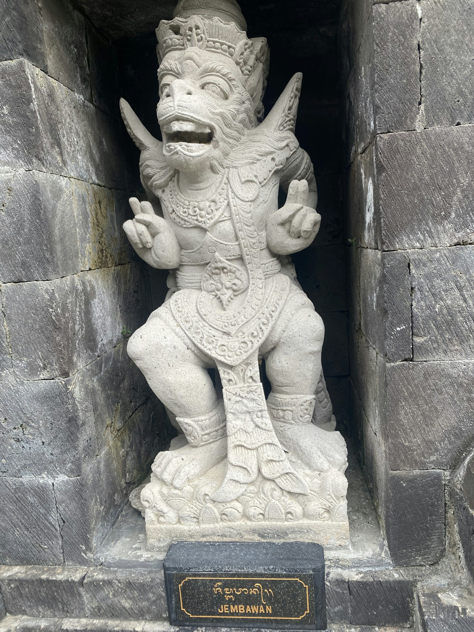 Stone sculpture depicting a mythical character from Balinese folklore
