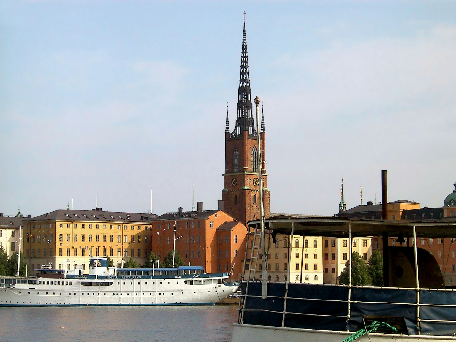Scenic view of Stockholm featuring historic buildings and church spire