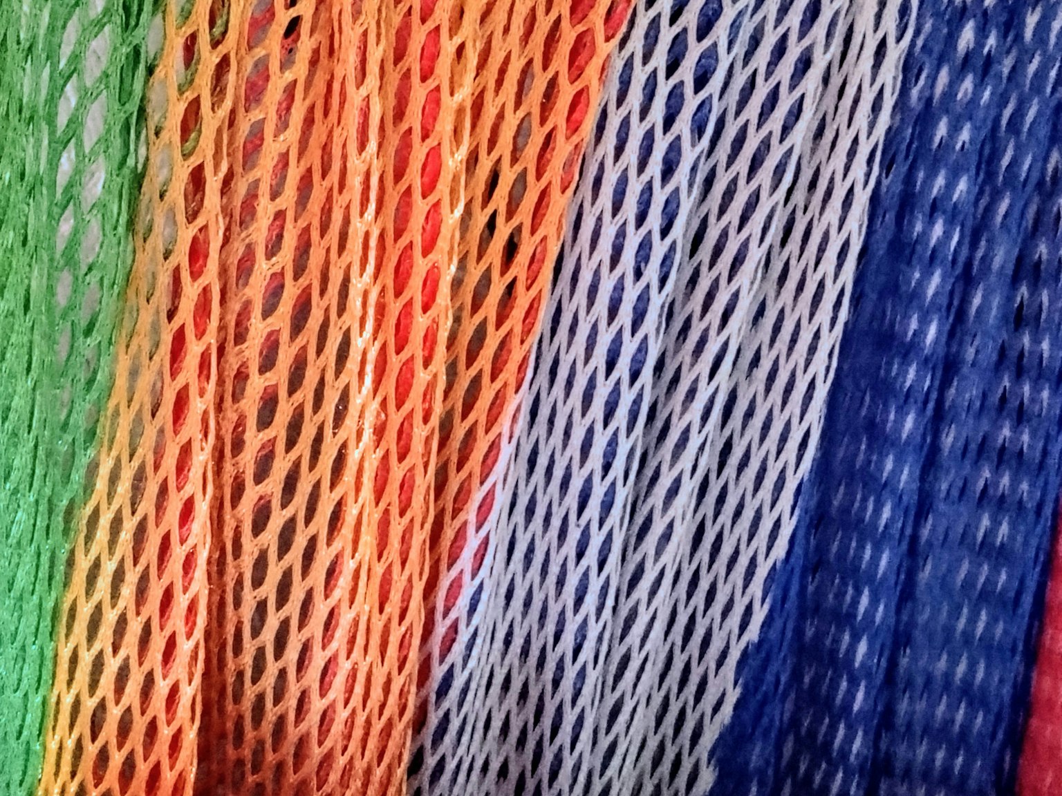 Colorful mesh materials arranged in vertical strips