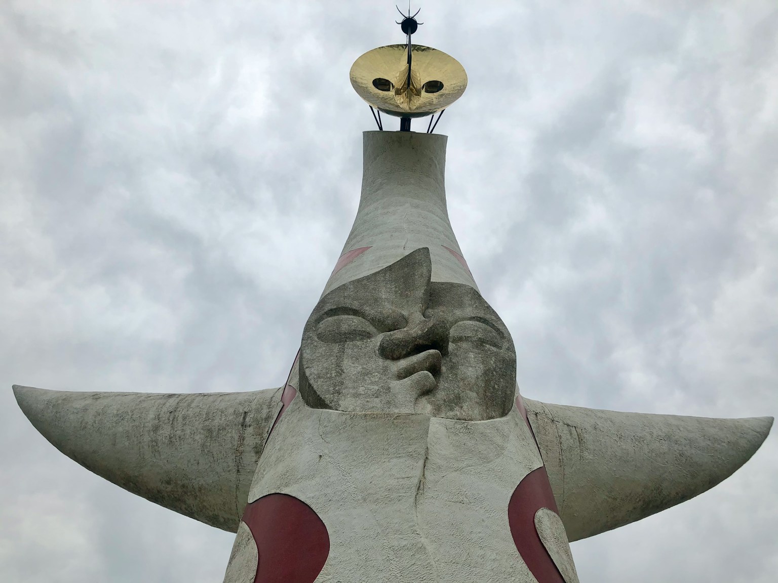 Unique design of the Tower of the Sun with expressive face