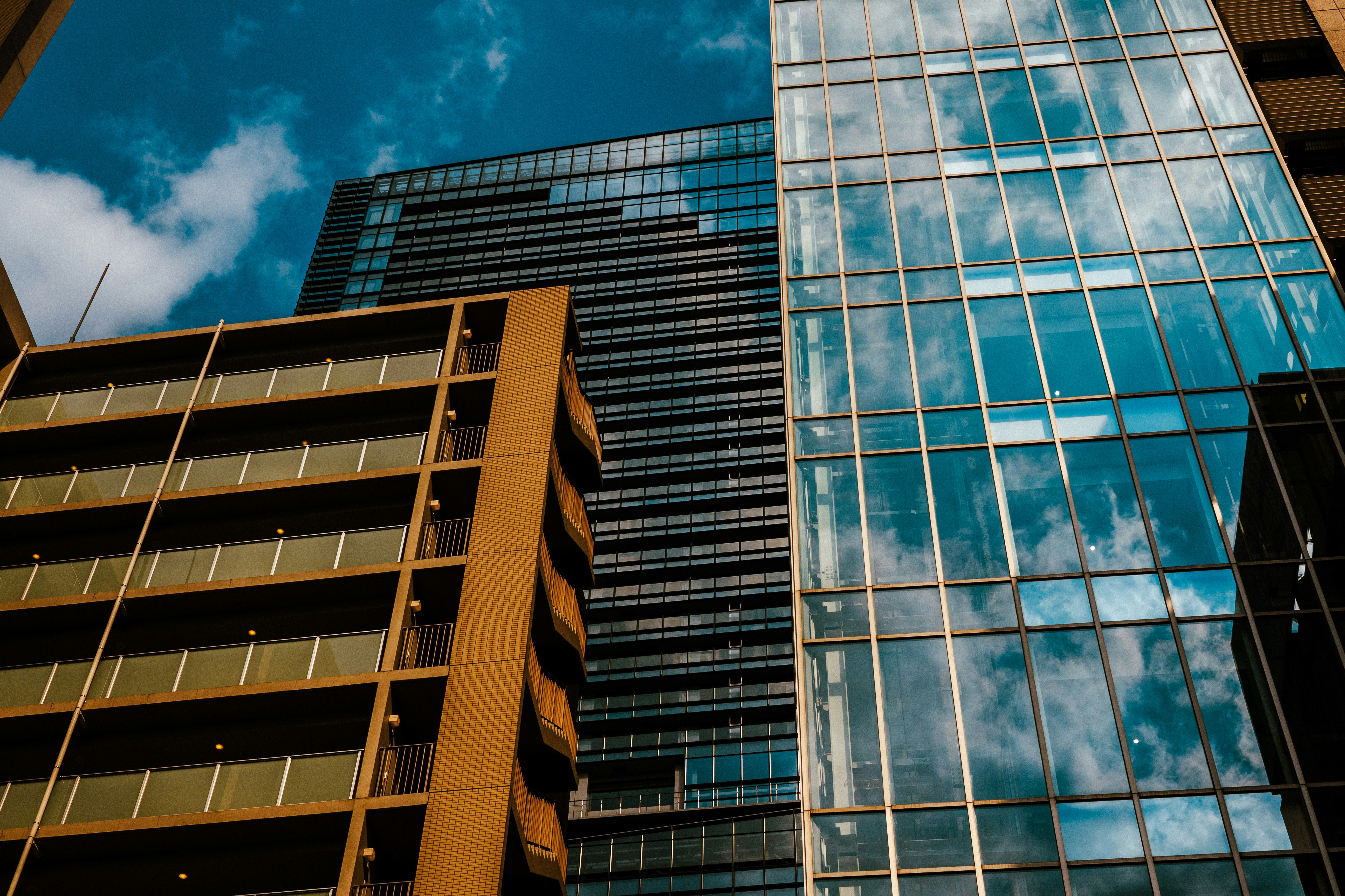 High-rise office buildings in an office district under a blue sky