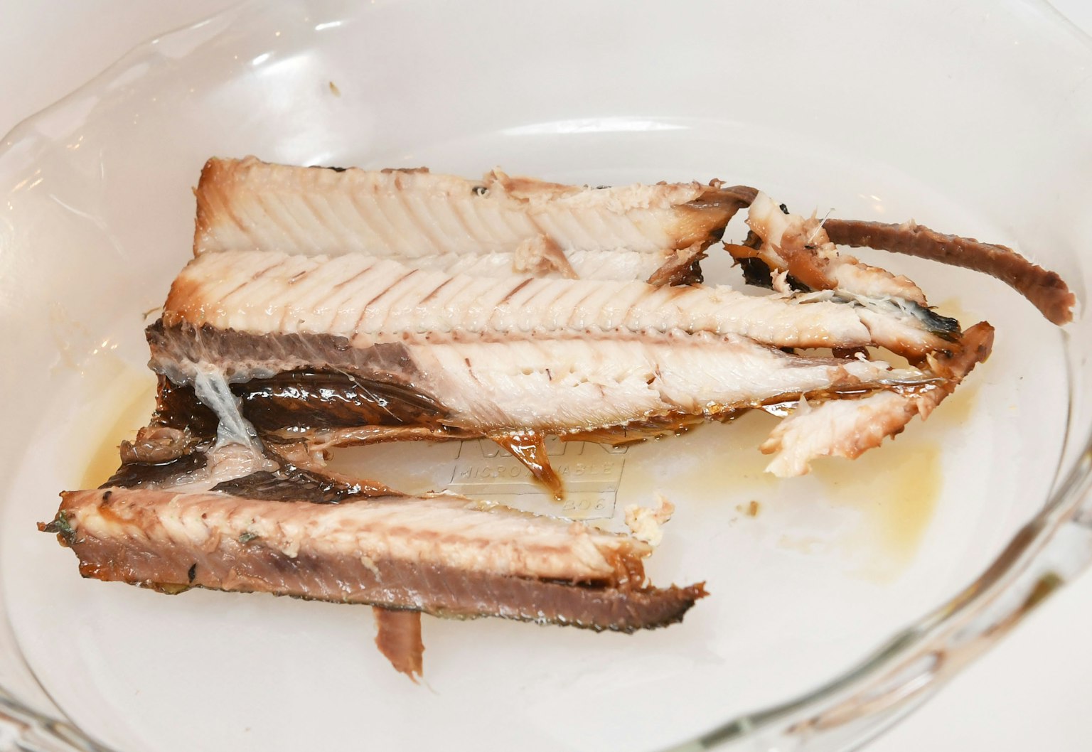Sliced smoked salmon on a white plate