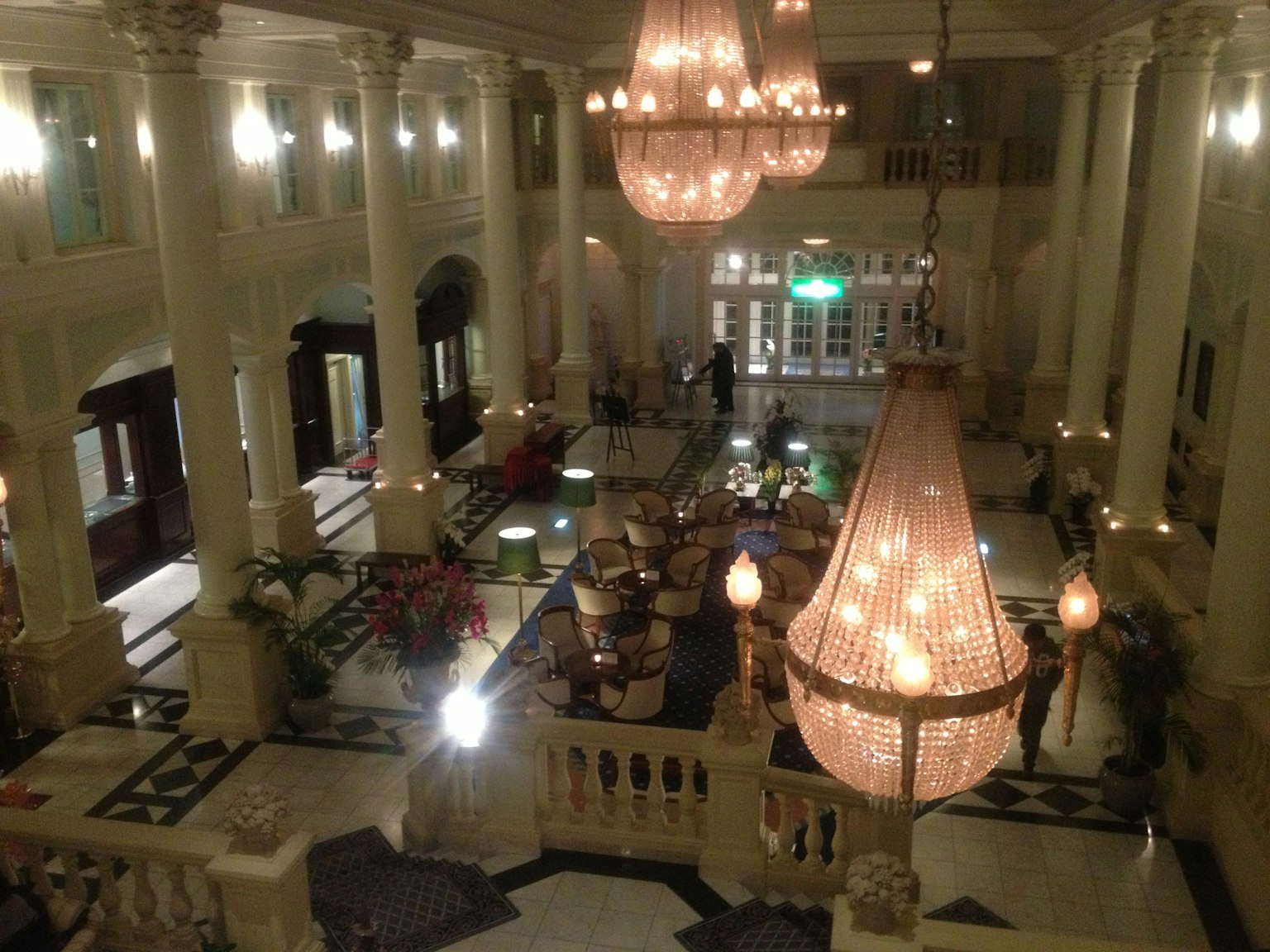 Elegant lobby with stunning chandeliers and soft lighting