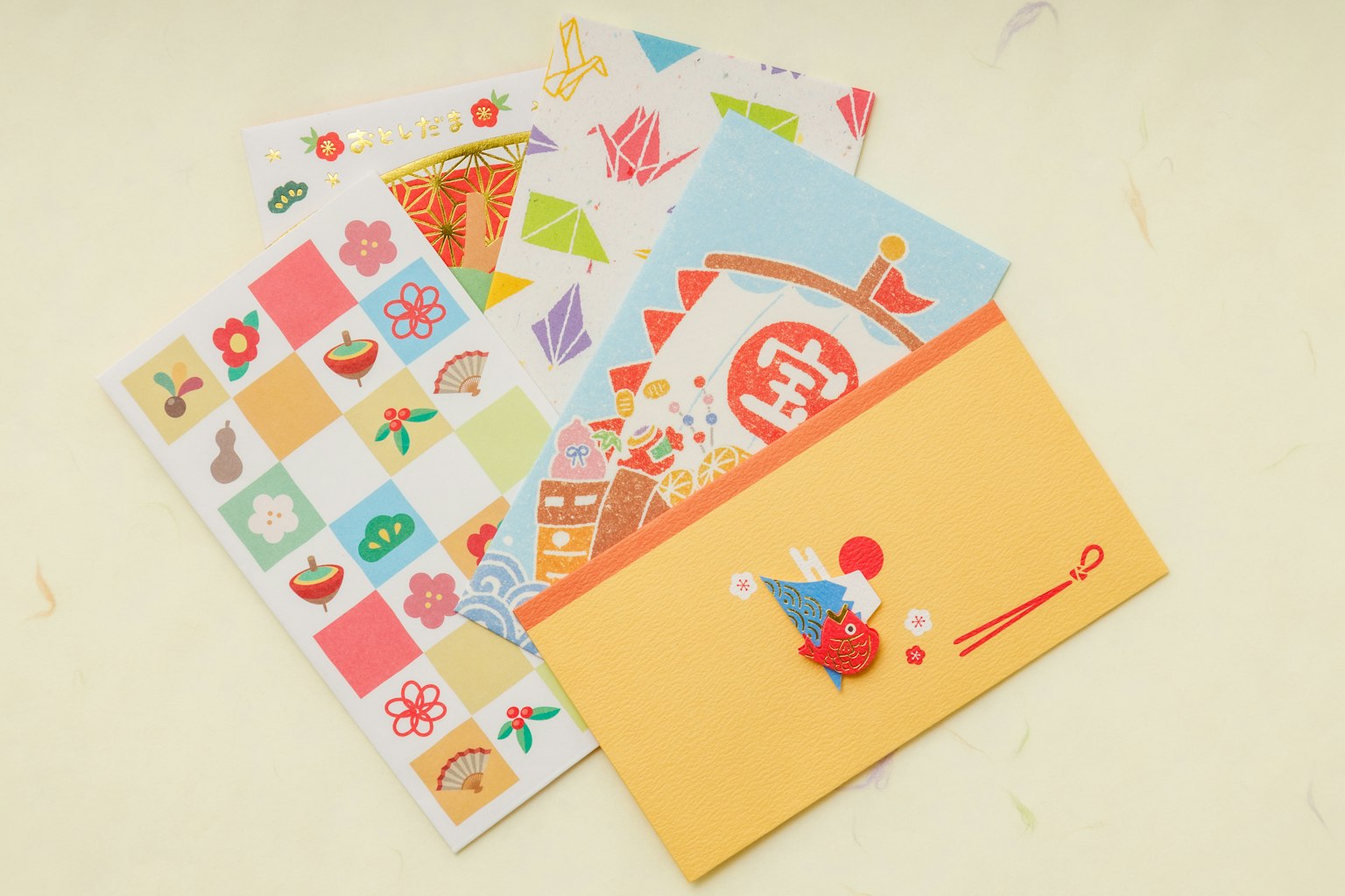 Colorful stickers and an envelope arranged in a playful layout