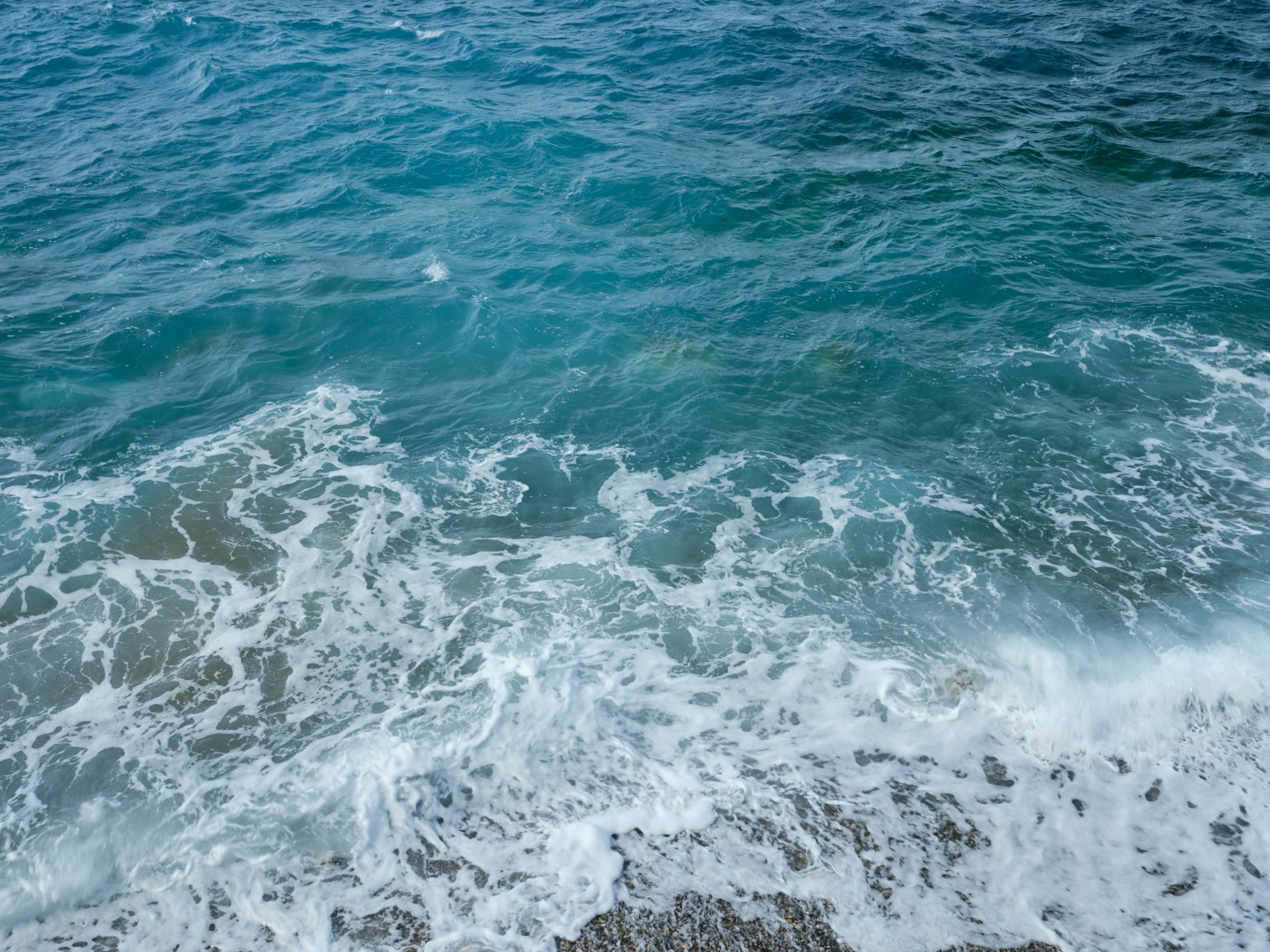 Beautiful view of blue sea and white waves