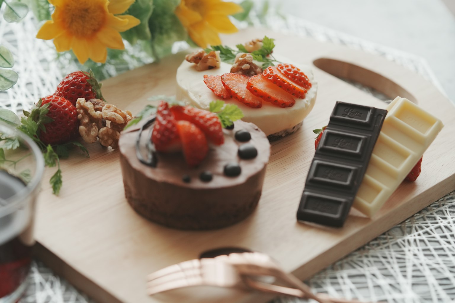 Delicious dessert platter featuring chocolate cake and fresh strawberries