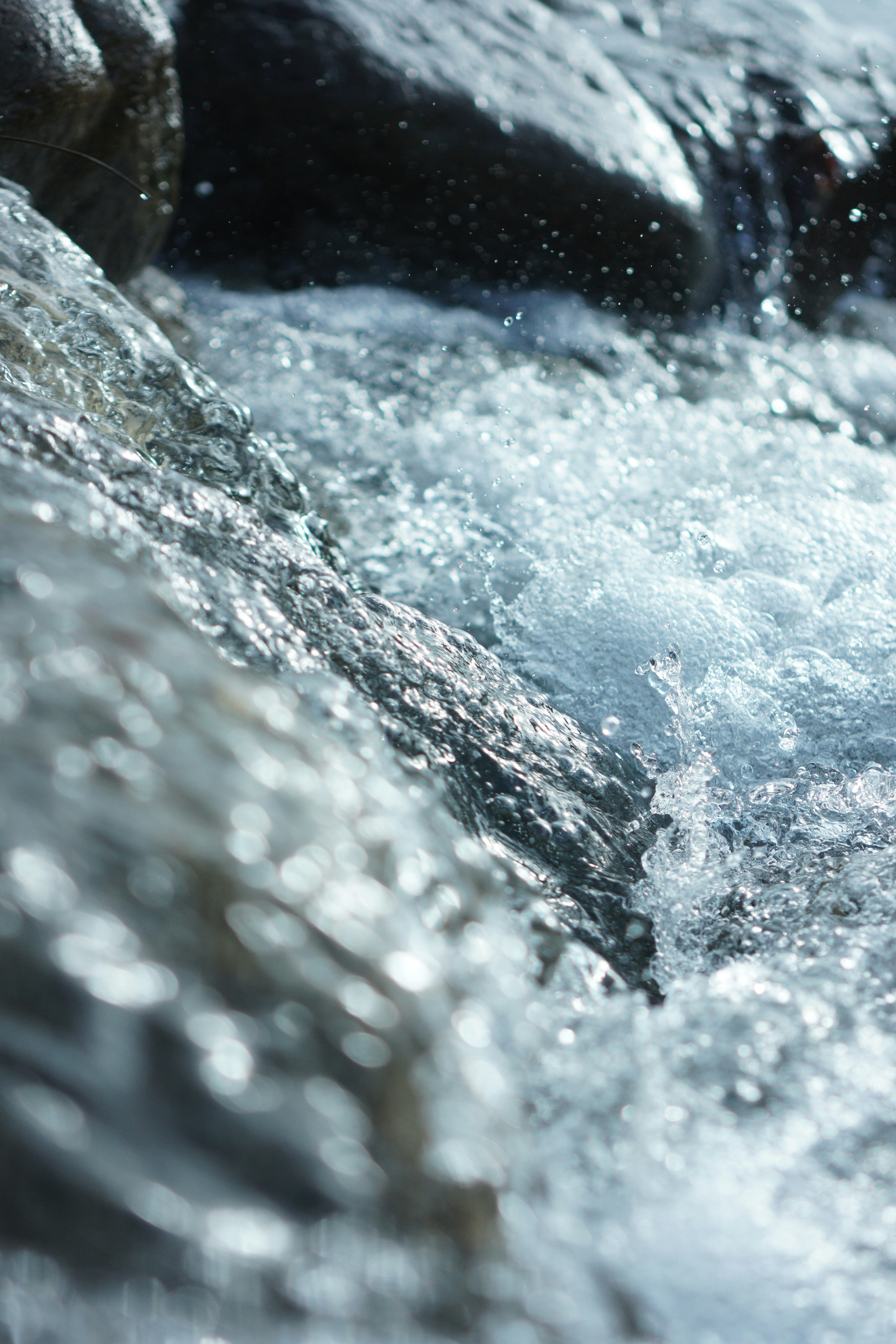 stream flow and splashing water over rocks