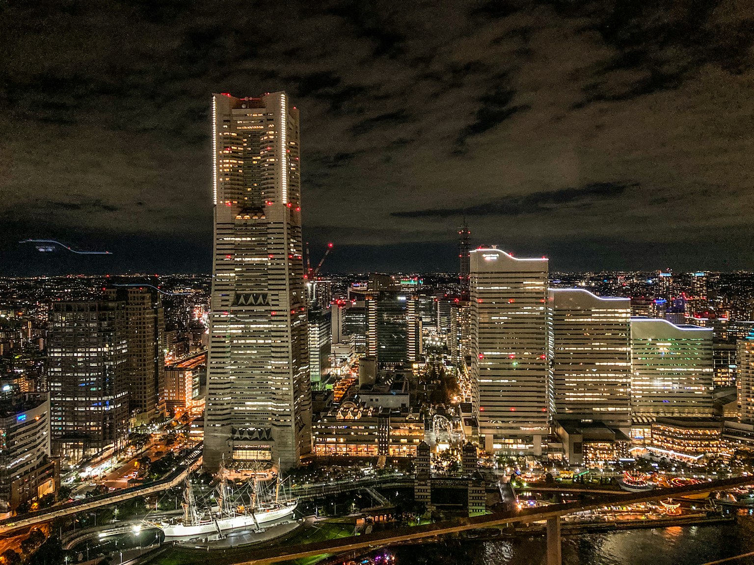 Night view of Yokohama's skyline with illuminated skyscrapers