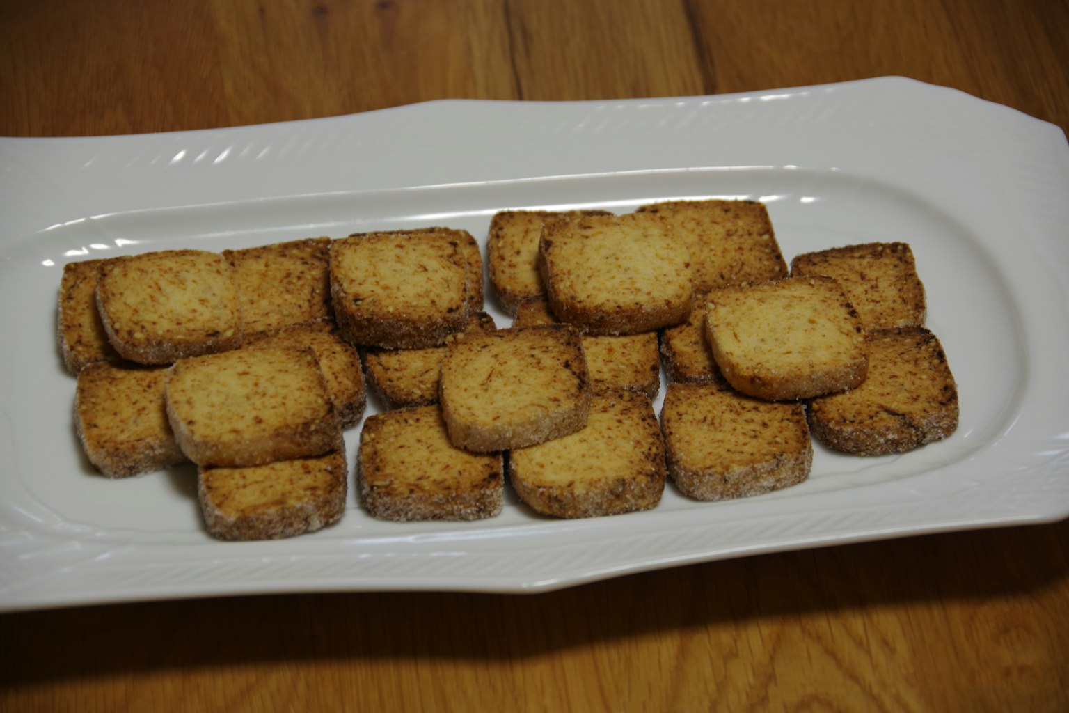 Cookies arranged on a white platter