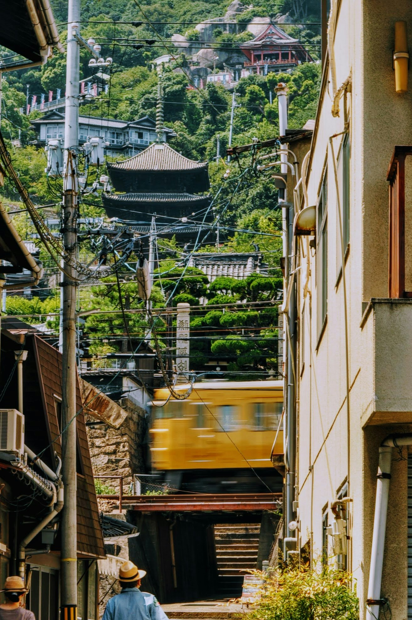 Onomichi hillside alley view with temple rooftops